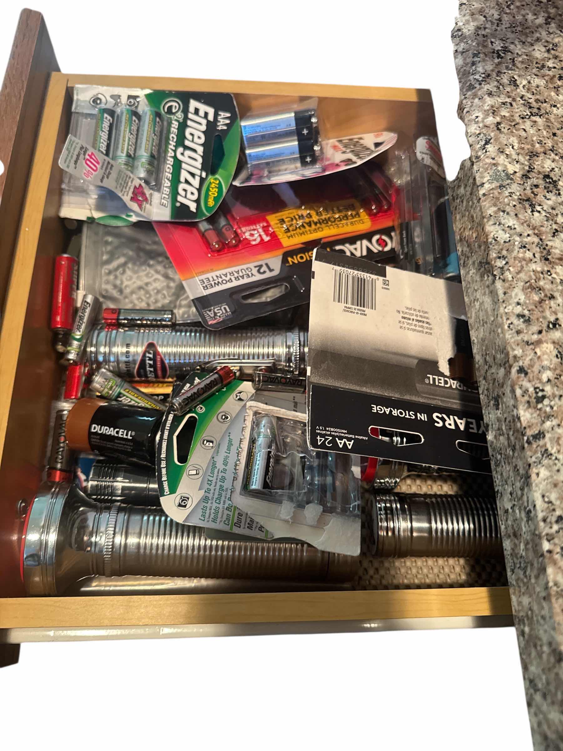 Photo 1 of CONTENTS OF DRAWER: FLASHLIGHTS AND BATTERIES