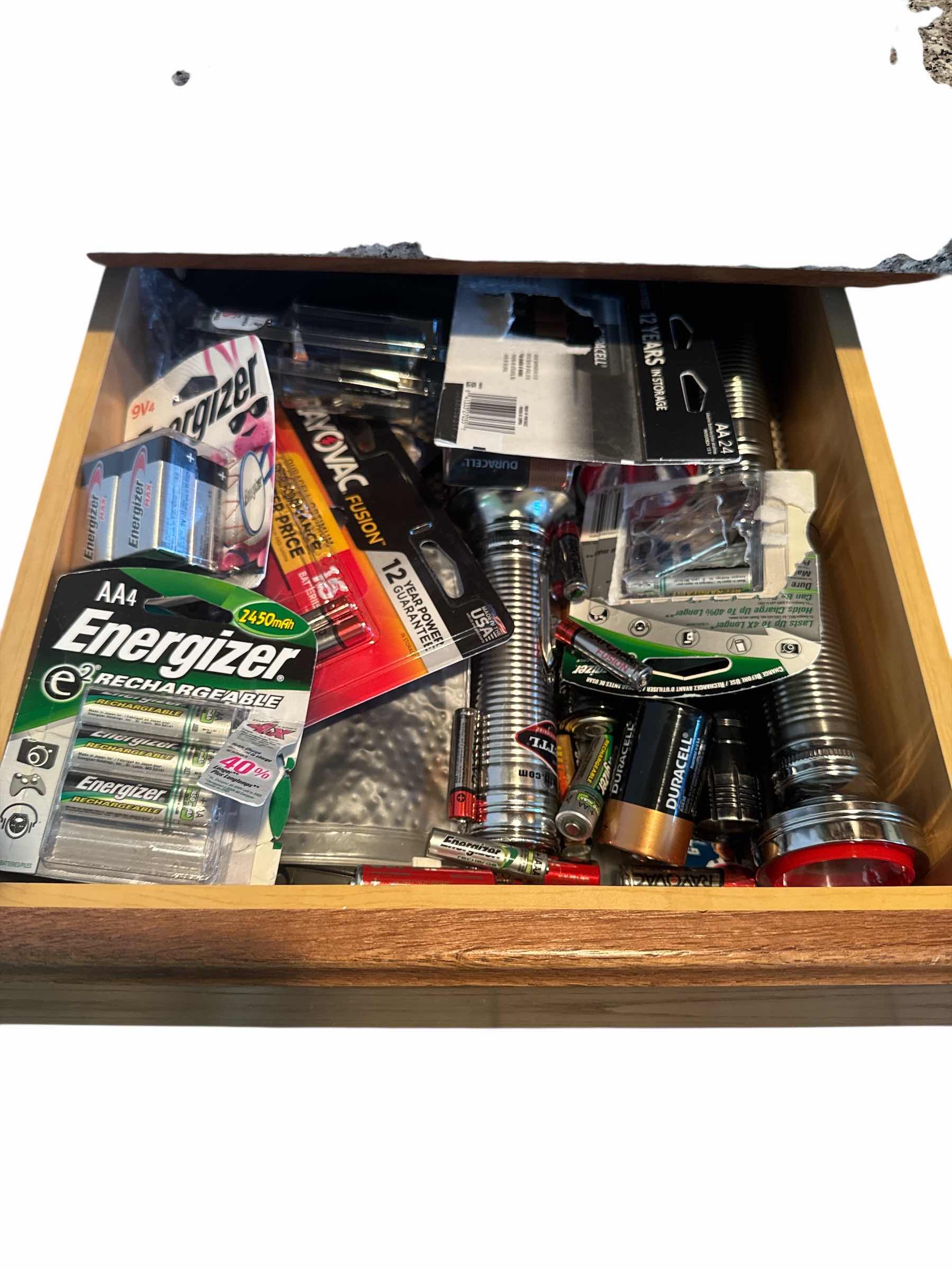 Photo 1 of CONTENTS OF DRAWER: FLASHLIGHTS AND BATTERIES