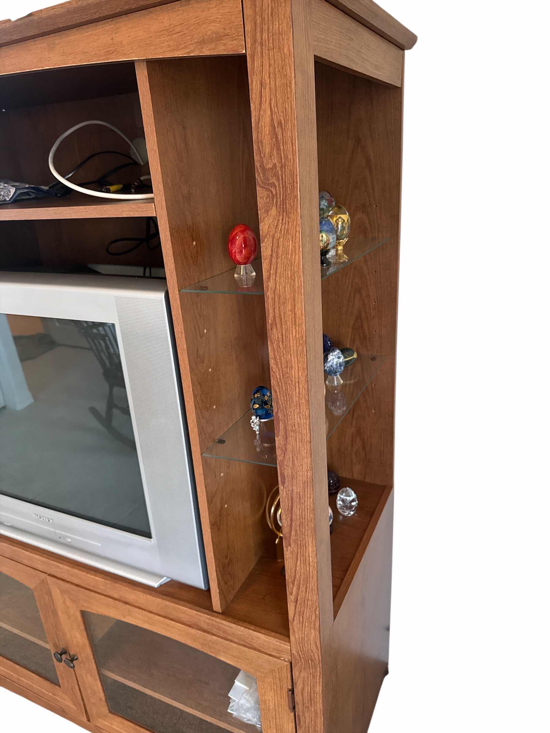 Photo 1 of PRESSED WOOD ENTERTAINMENT CENTER WITH GLASS SIDE SHELVES (NOTHING ELSE IS INCLUDED)