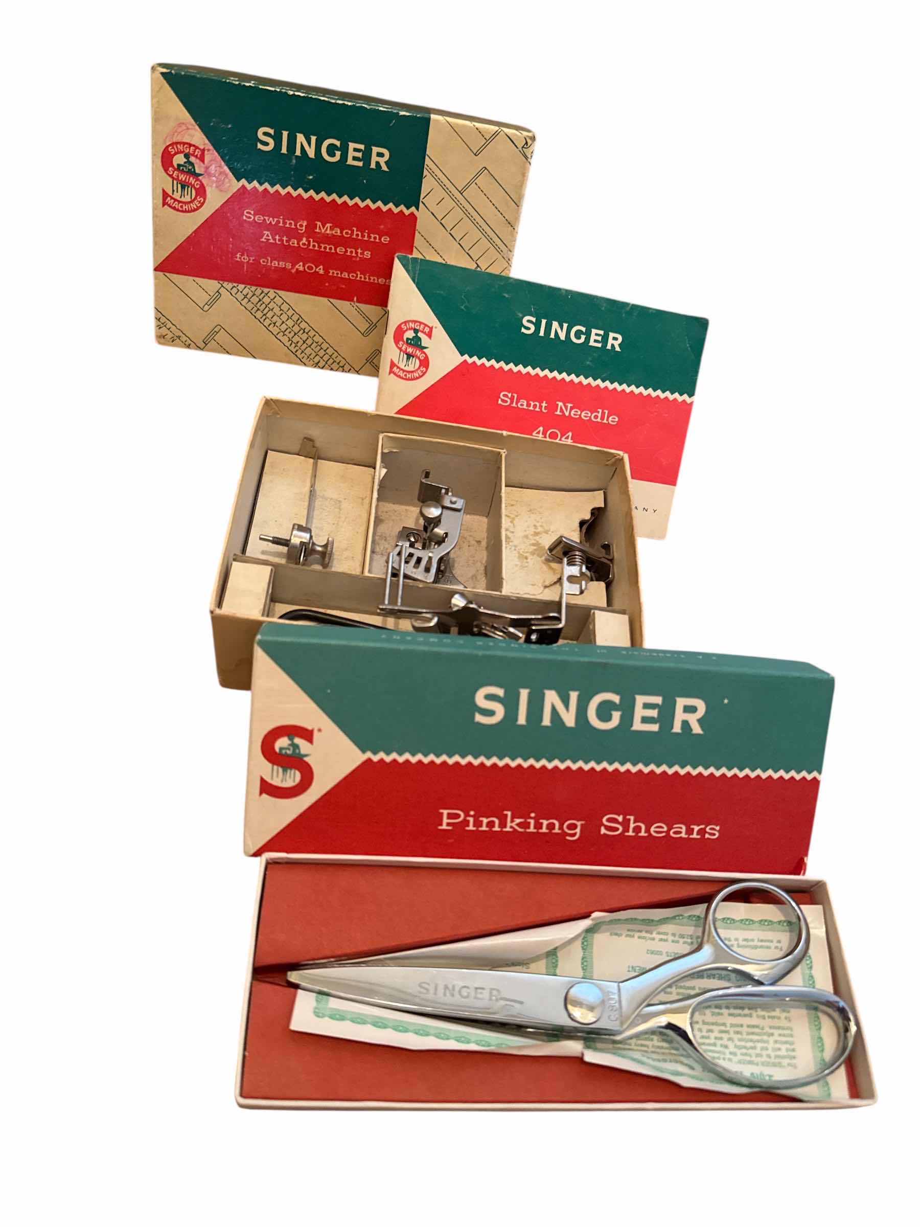 Photo 1 of VINTAGE SINGER SEWING MACHINE ATTACHMENTS AND PINKING SHEERS
