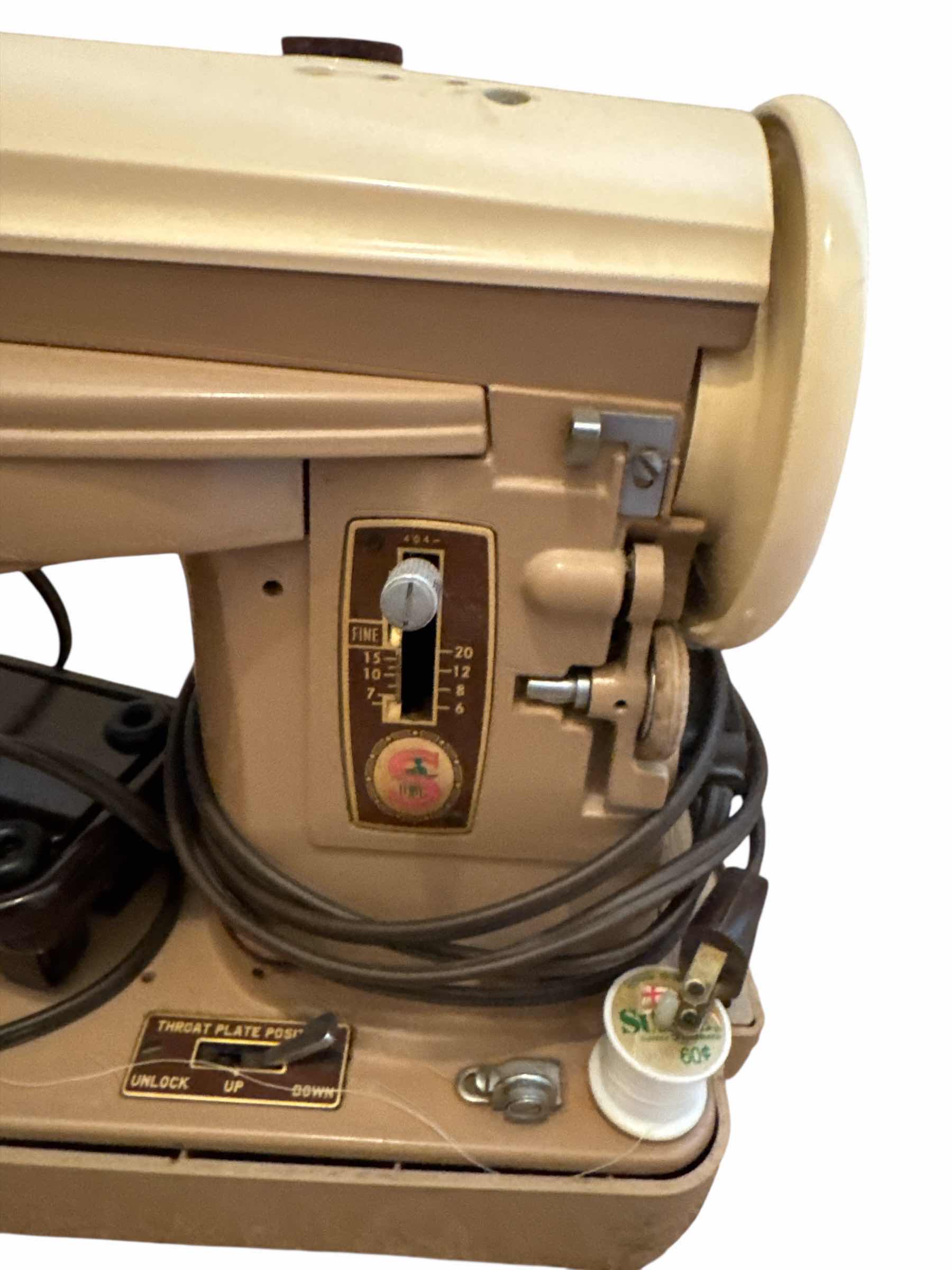 Photo 1 of SINGER SEWING MACHINE