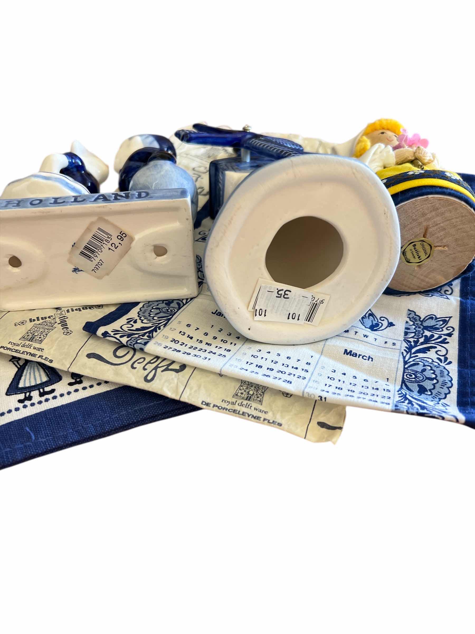 Photo 1 of BLUE AND WHITE DUTCH POTTERY FIGURINES AND LINEN