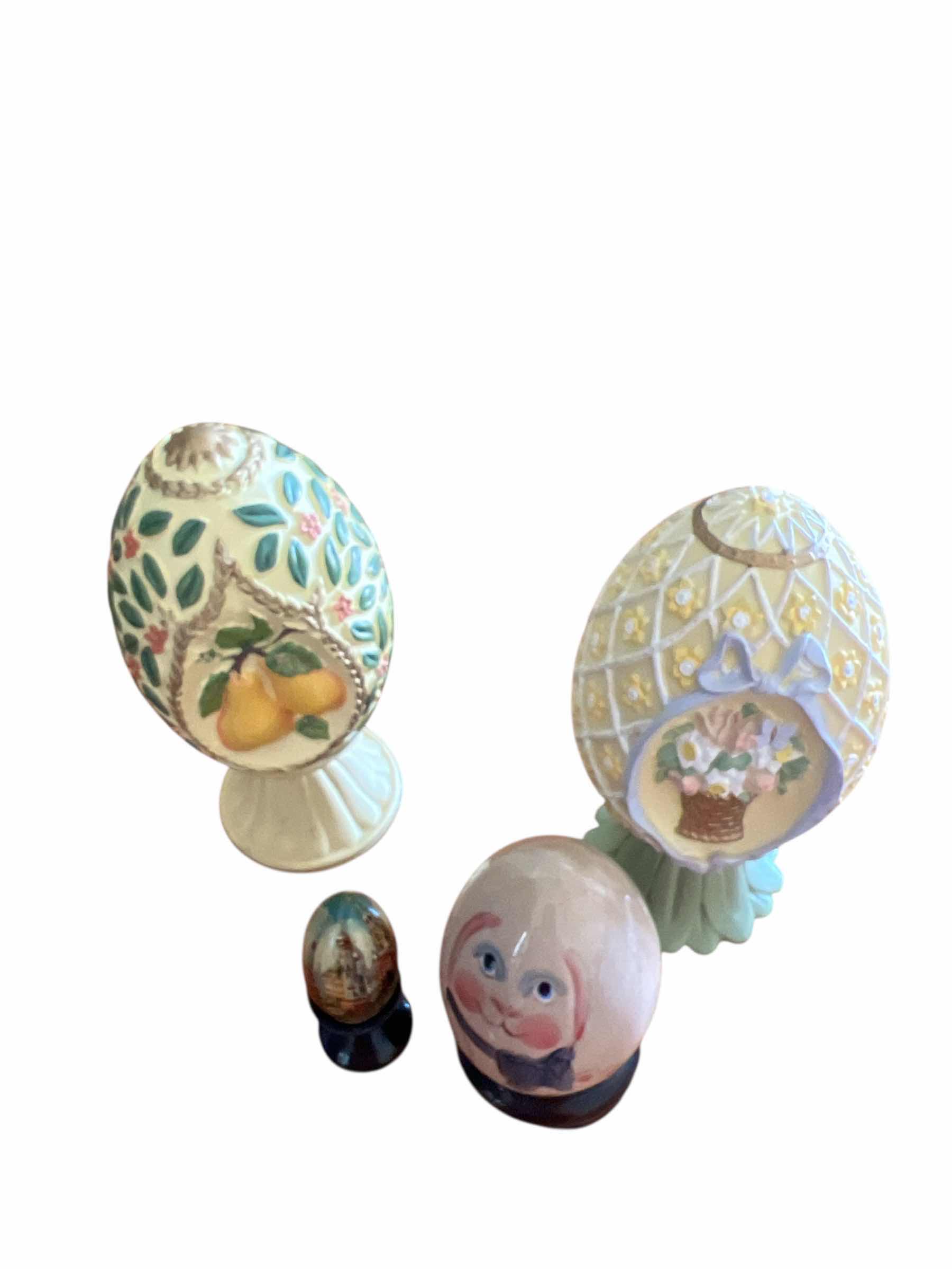 Photo 1 of TWO AVON SEASONS TREASURES EGGS, ONE HAND BLOWN GLASS EGGS AND ONE HAND PAINTED WOODEN EGG