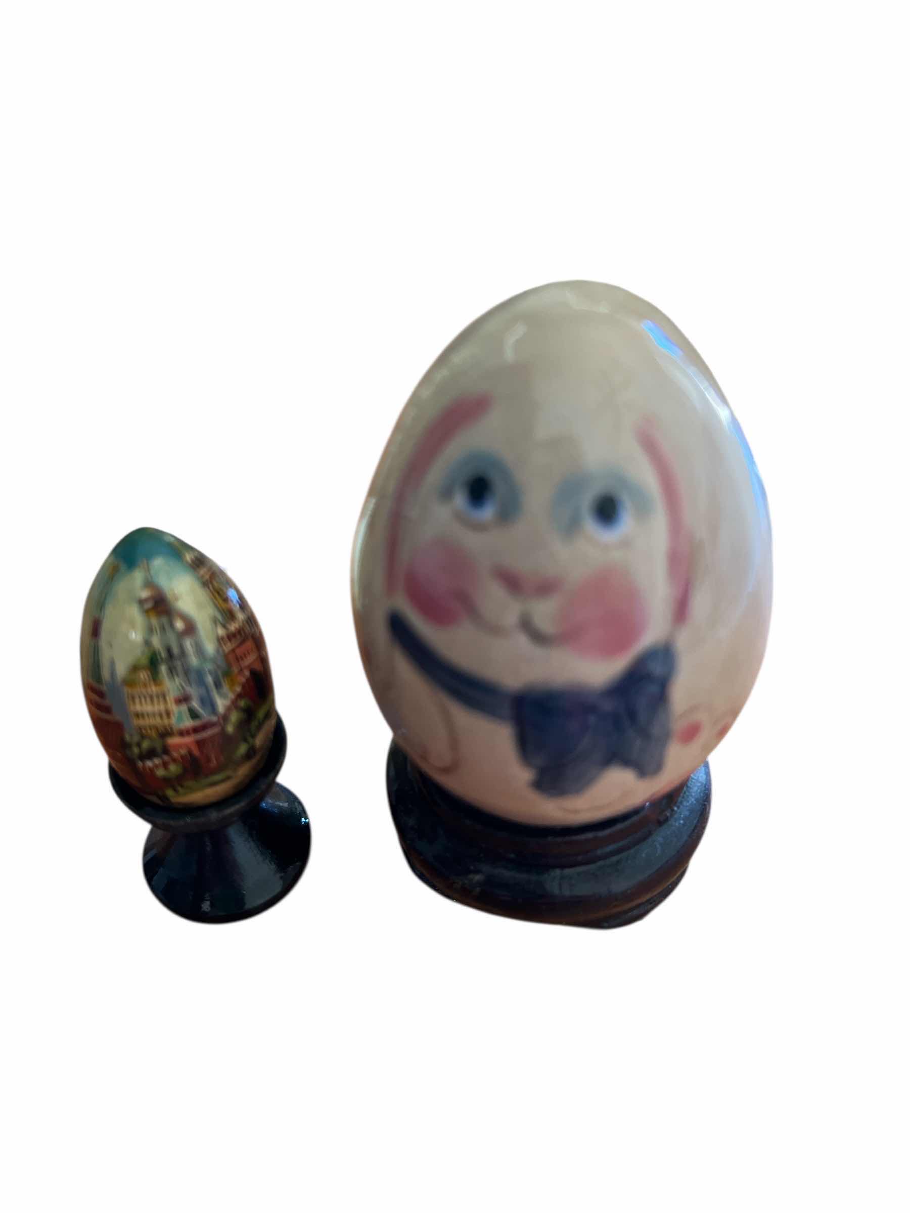 Photo 1 of TWO AVON SEASONS TREASURES EGGS, ONE HAND BLOWN GLASS EGGS AND ONE HAND PAINTED WOODEN EGG