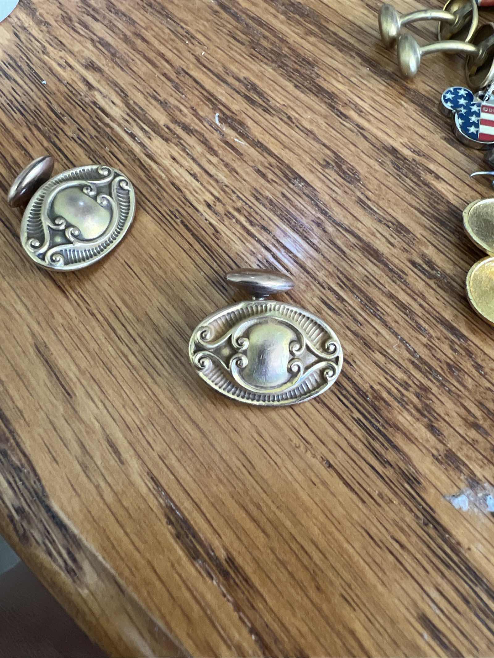 Photo 1 of SMALL BAKELITE RING BOX WITH VINTAGE CLIP-ON EARRINGS, TIE TACKS MICKEY MOUSE CHARMS AND MORE