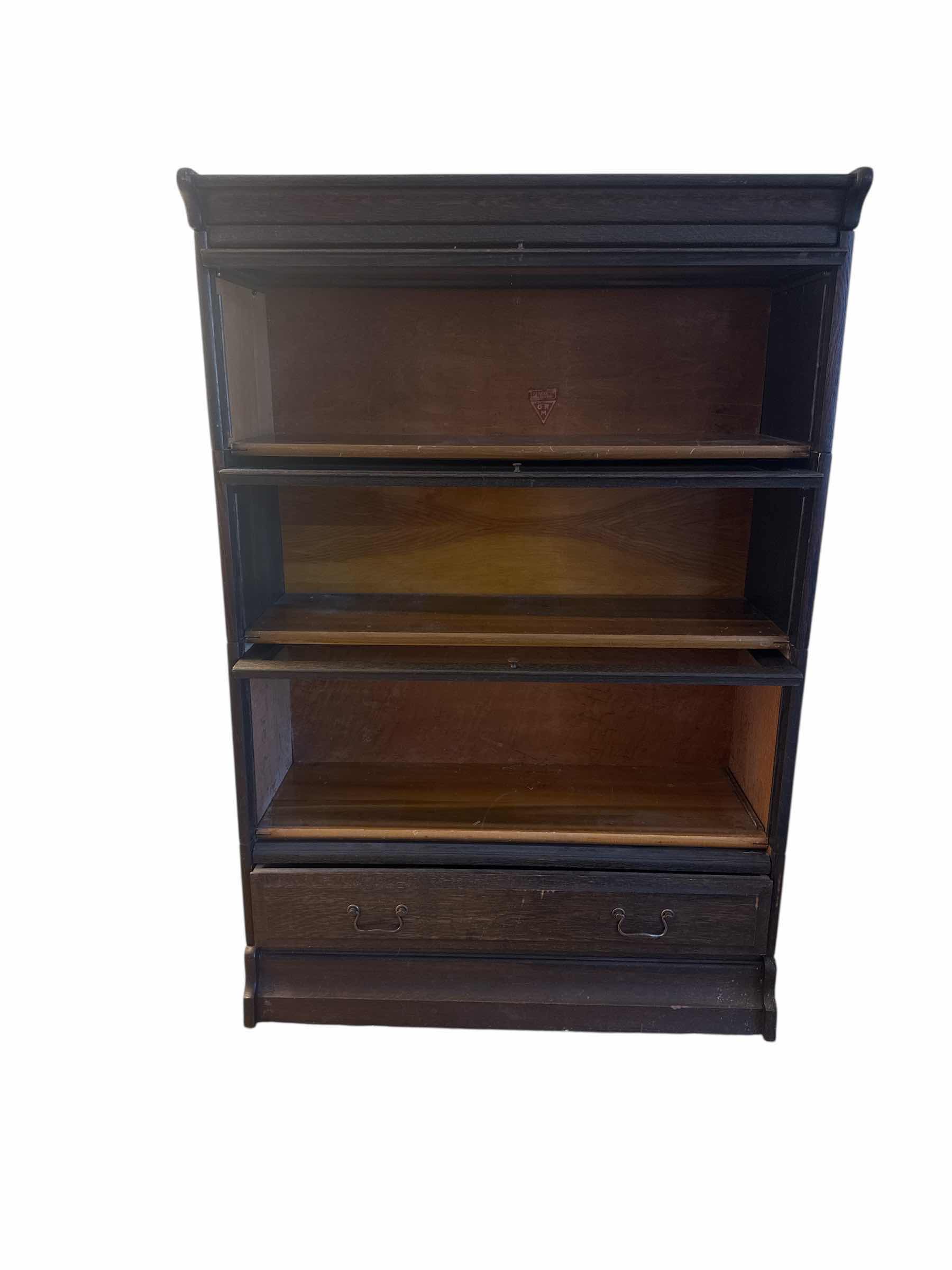 Photo 1 of 1500
ANTIQUE BARRISTER STYLE BOOKCASE IN DARK WOOD STAIN. 3 SHELVES, 1 DRAWER