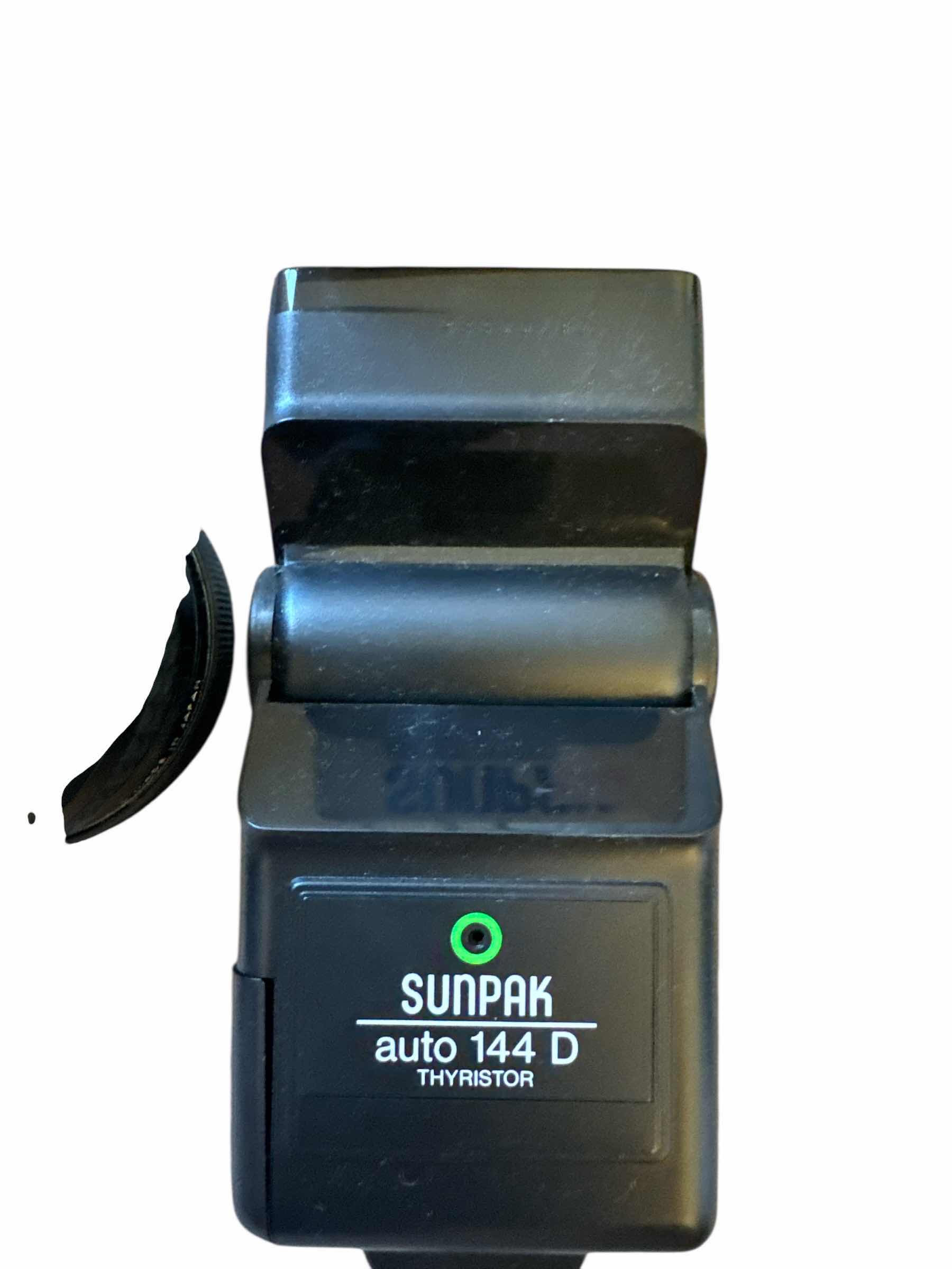 Photo 1 of FOCAL CAMERA LENS 1:28 & SUNPAK AUTO 144D
