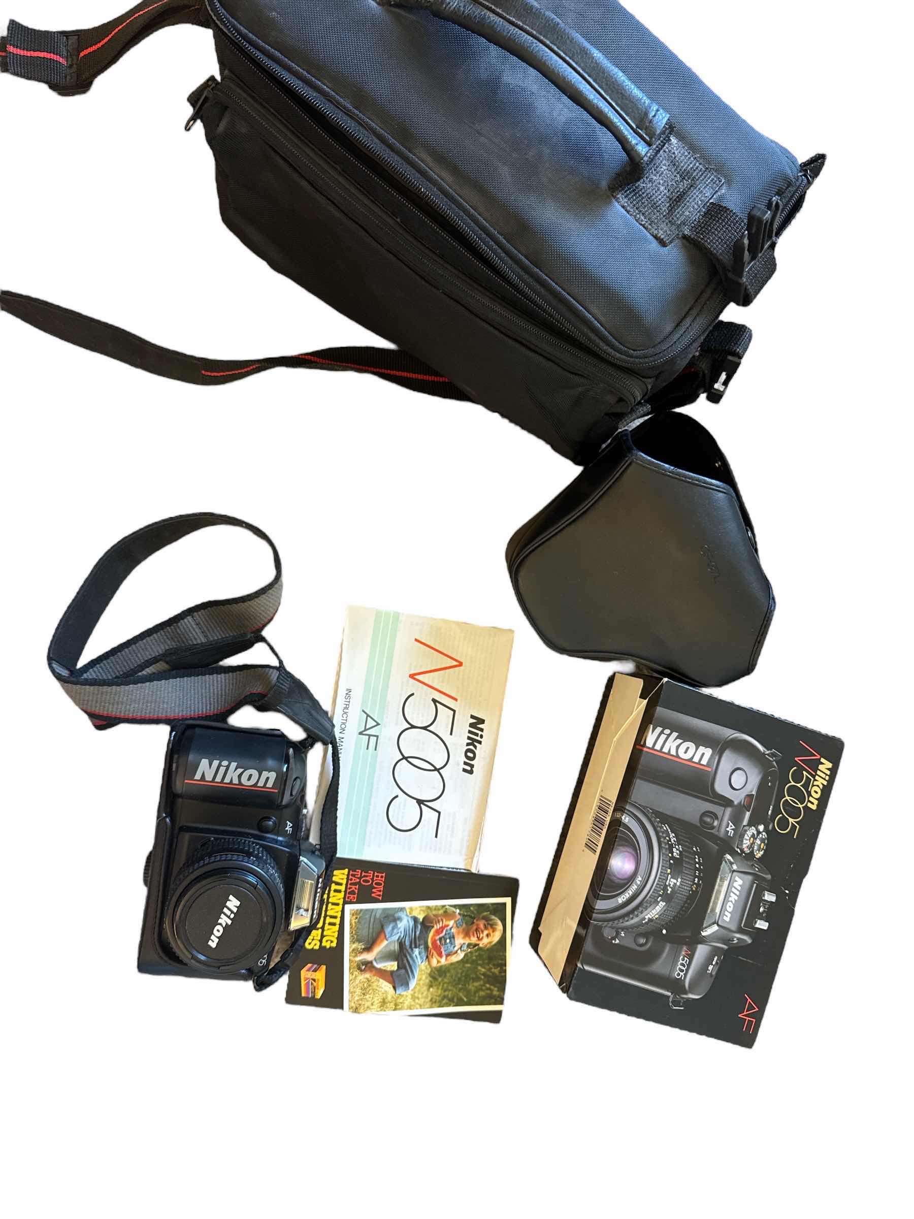 Photo 1 of 70
NIKON N5005 WITH BAG, BOX & MANUAL
