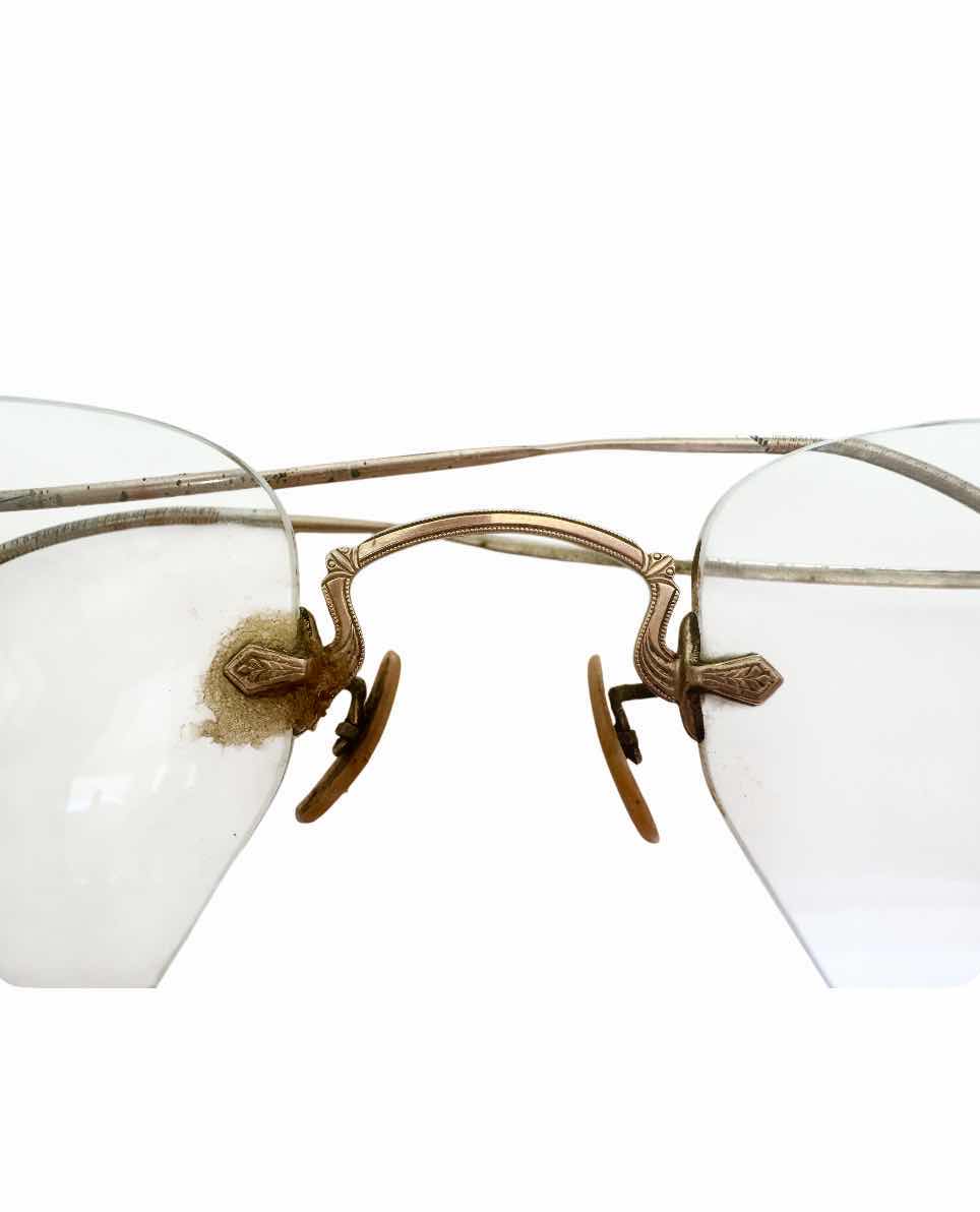 Photo 1 of 150
ANTIQUE WIRE RIM 12K GOLD GLASSES WITH CARRYING CASE. 

GLASSES WHEN FOLDED
L1.75” X W4.75”