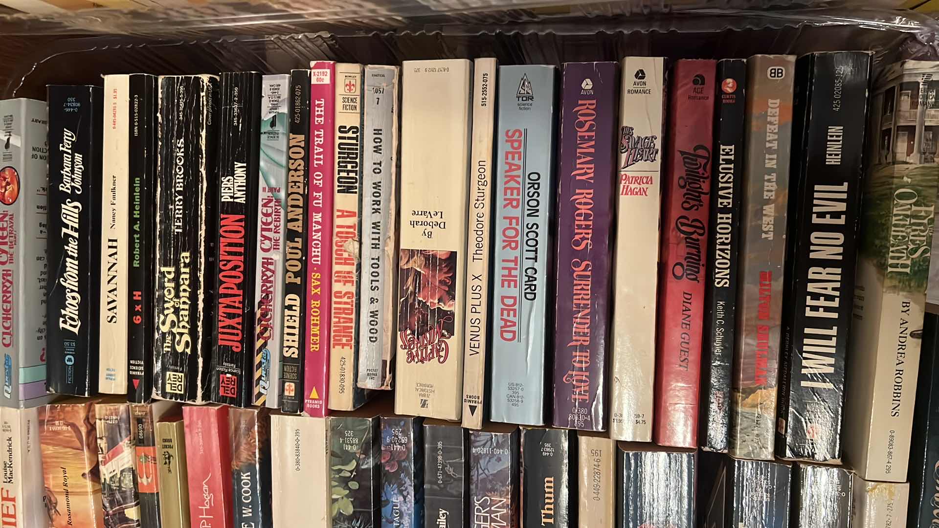 Photo 1 of PLASTIC TRAY OF SOFTCOVER NOVELS