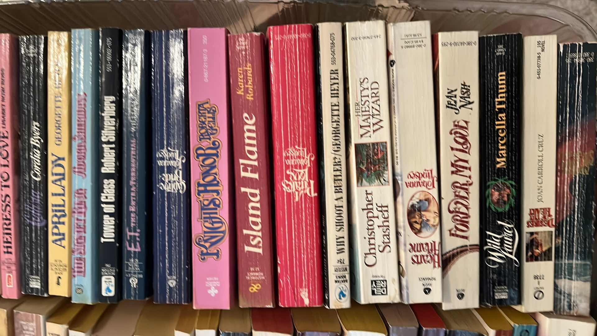 Photo 1 of PLASTIC TRAY OF ROMANCE NOVELS