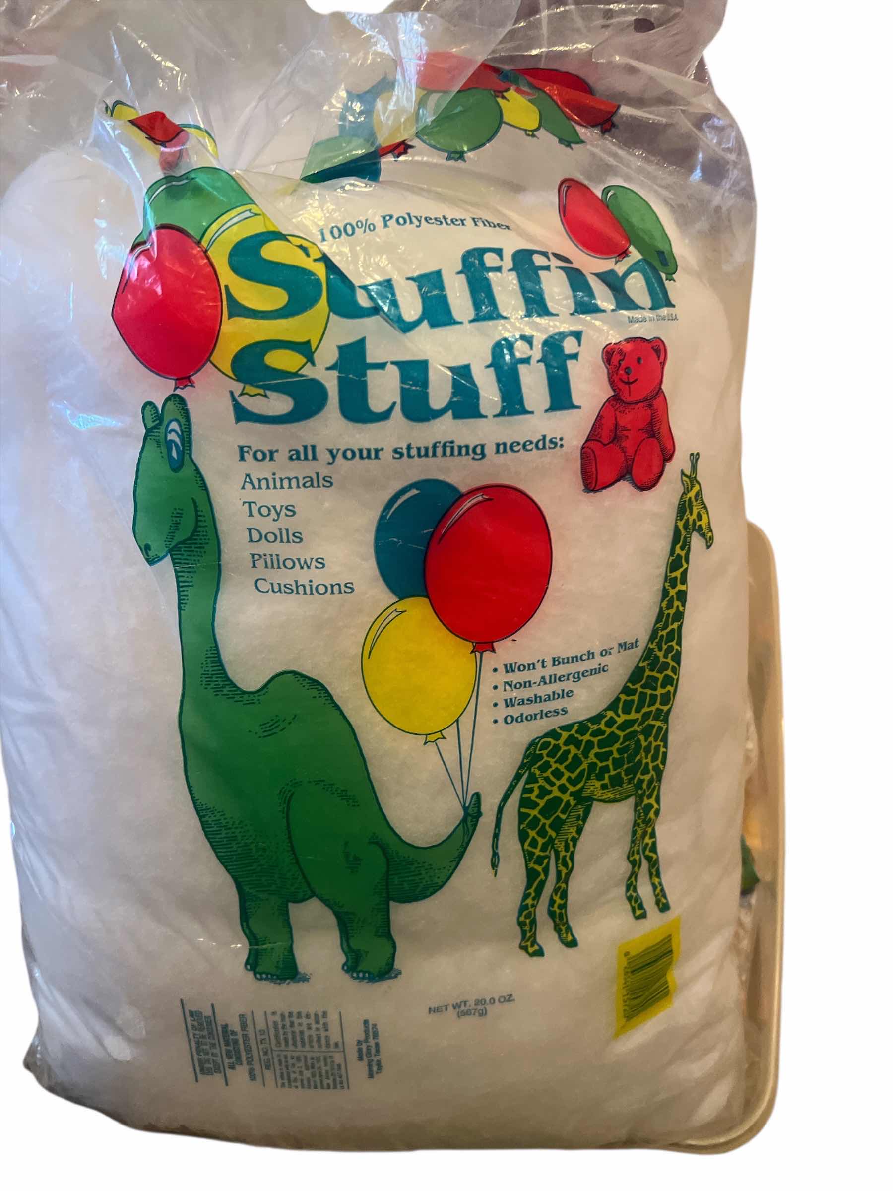 Photo 1 of QUILTING BATTING - KING SIZE - MOUNTAIN MIST - STUFFED ANIMAL POLYESTERS FILL AND PLASTIC CONTAINER OF FABRIC