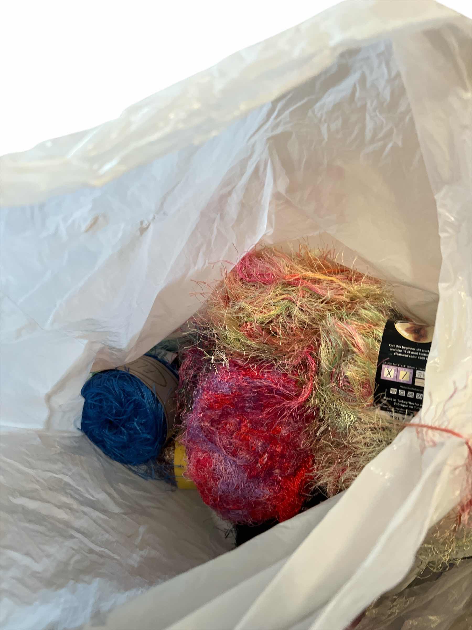 Photo 1 of BAG OF FUZZY YARN, STRAW INTO GOLD YARN AND MORE