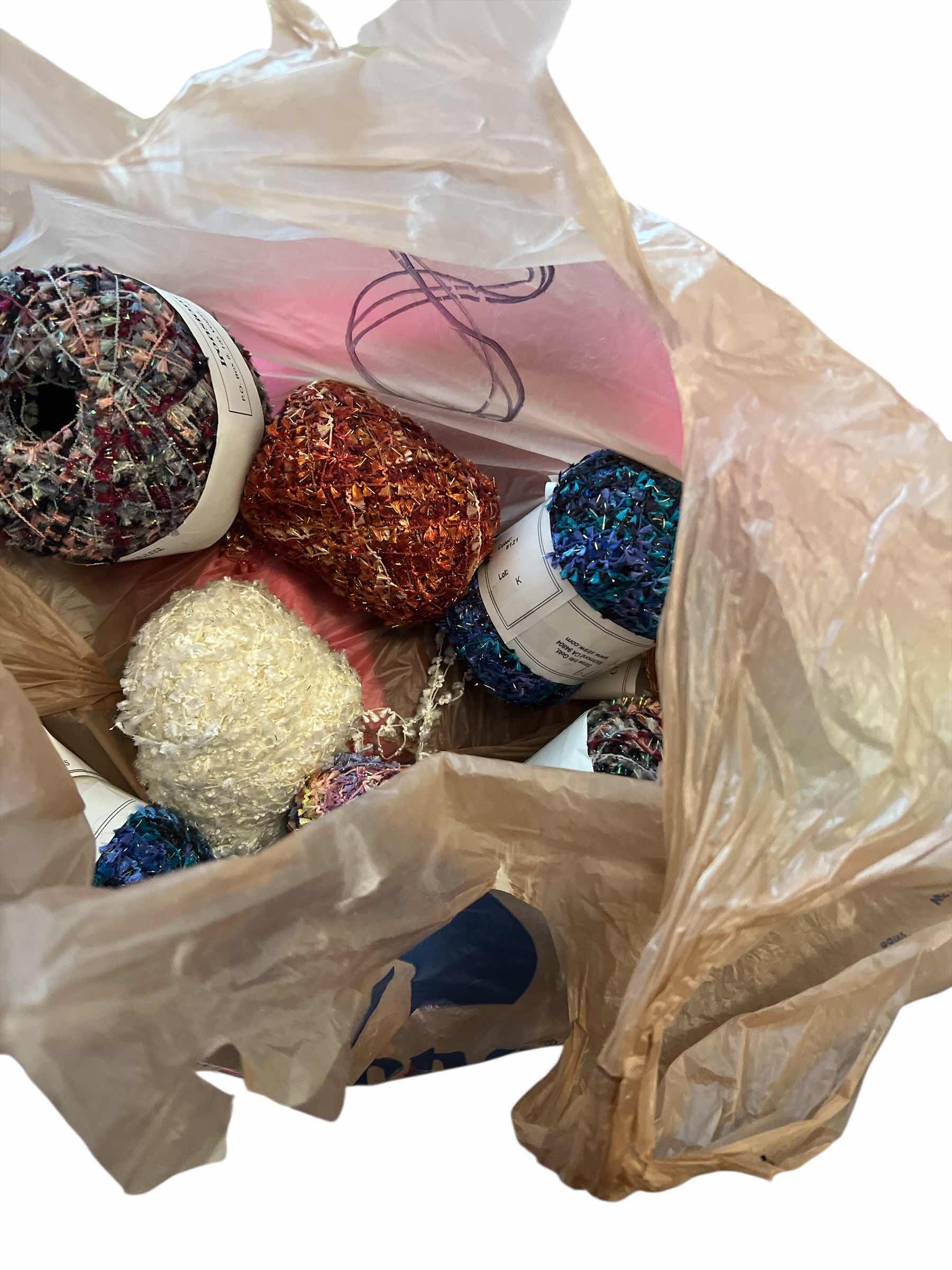 Photo 1 of BAG OF BLACK FABRIC AND SELECTION OF COLORFUL FABRIC AND STRAW INTO GOLD THREAD