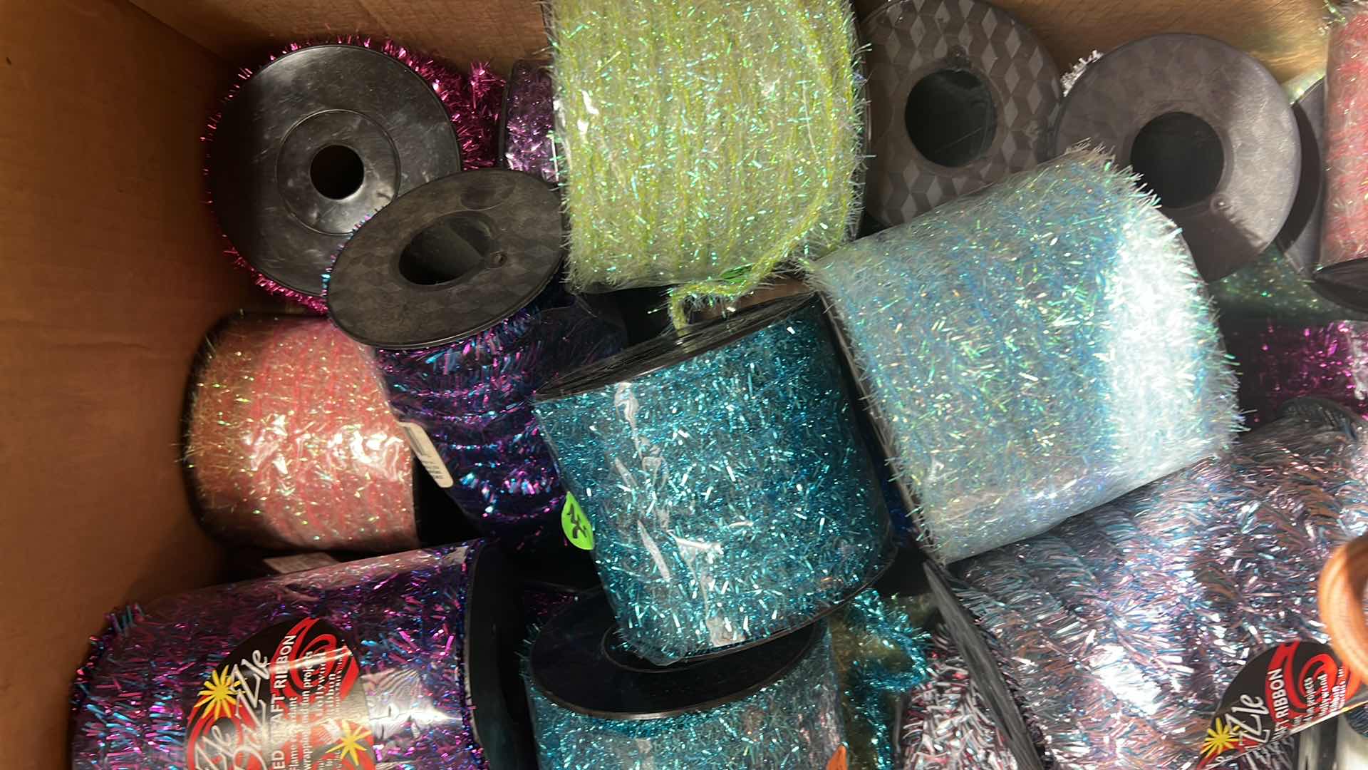 Photo 1 of BOX OF RAZZLE DAZZLE METALLIC WIRE CRAFT RIBBON AND MORE