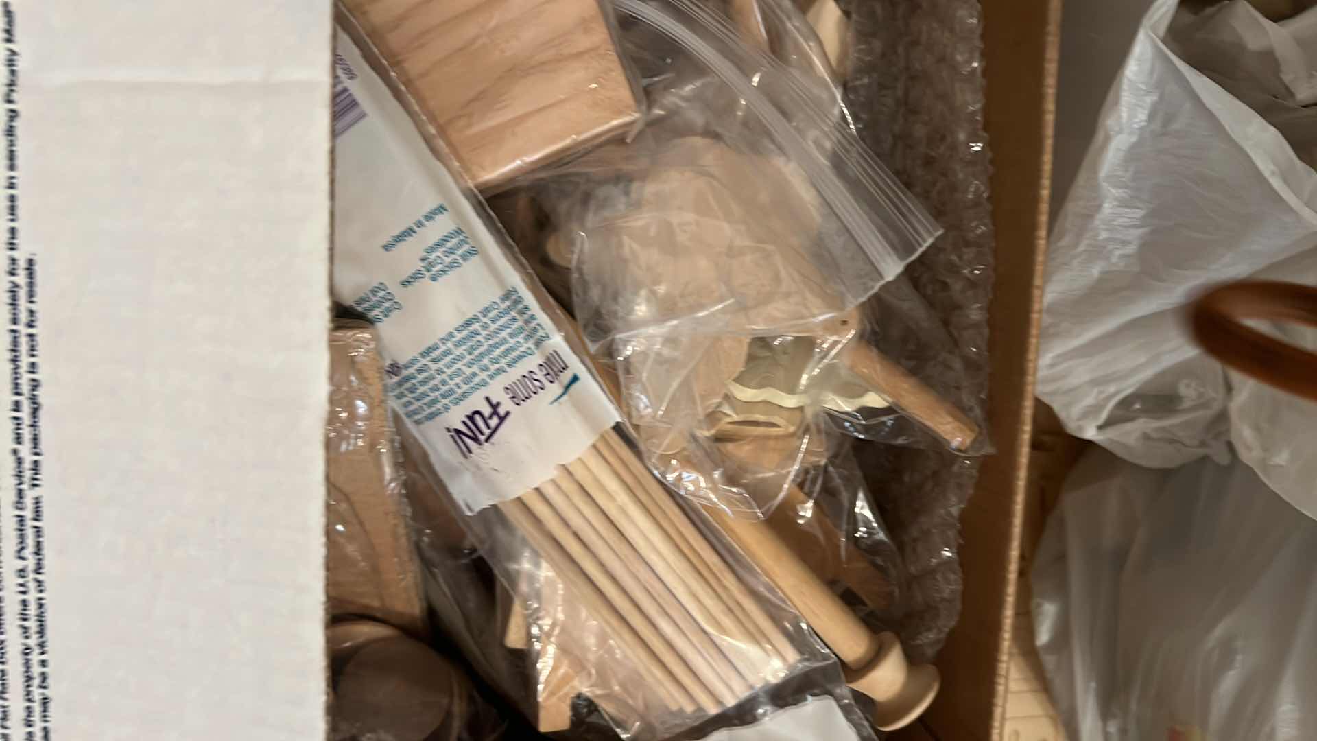 Photo 1 of BOX AND TWO BAGS OF WOOD CRAFTING SUPPLIES