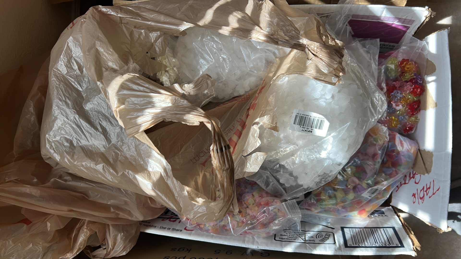 Photo 1 of BOX OF PLASTIC FLOWER BEADS AND BUTTONS