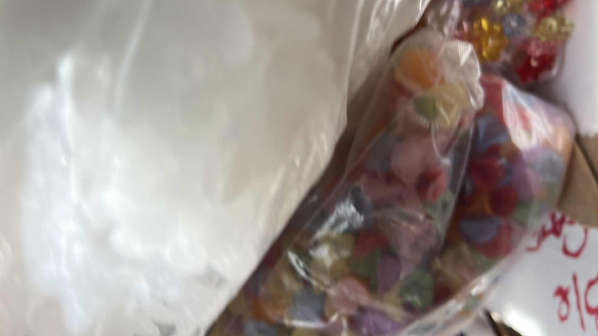 Photo 1 of BOX OF PLASTIC FLOWER BEADS AND BUTTONS