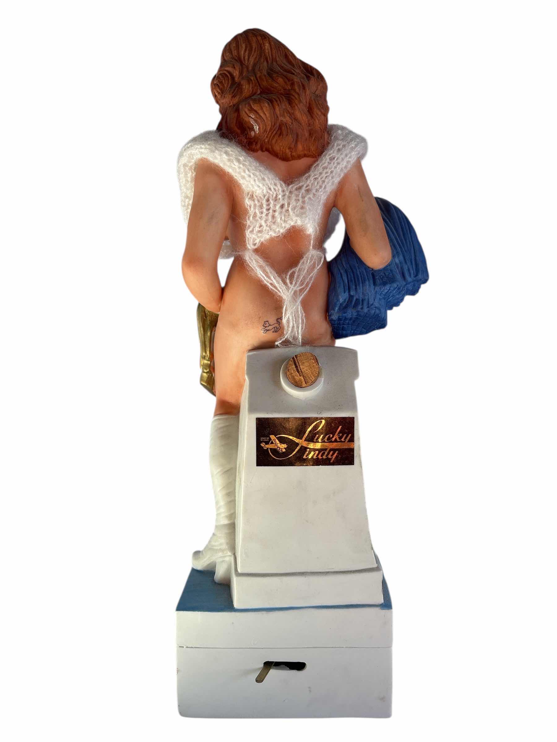 Photo 1 of VINTAGE NUDE CHEERLEADER MUSIC BOX DECANTER H14.75”