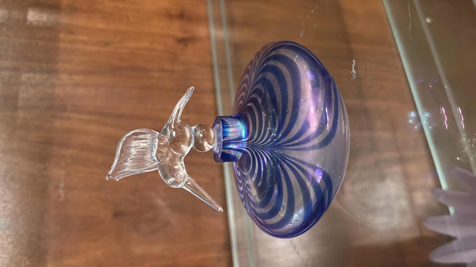 Photo 1 of VINTAGE ART GLASS PERFUME BOTTLE FEATURING A CLEAR GLASS HUMMINGBIRD STOPPER. H4.5”