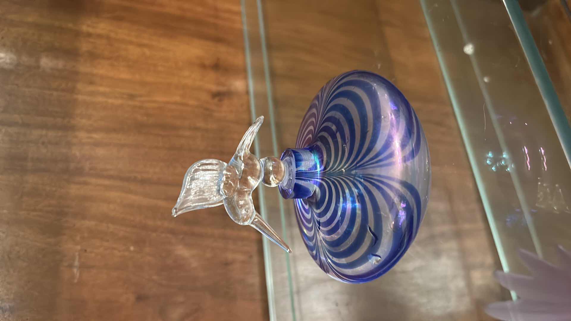 Photo 1 of VINTAGE ART GLASS PERFUME BOTTLE FEATURING A CLEAR GLASS HUMMINGBIRD STOPPER. H4.5”