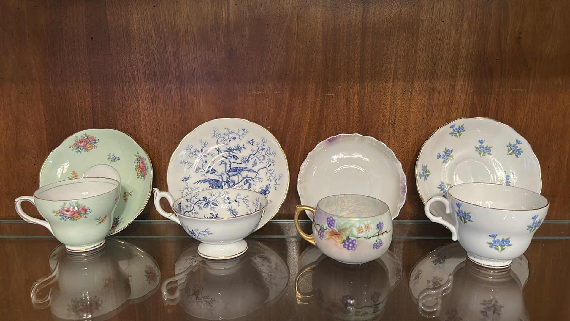 Photo 1 of 4 VINTAGE PORCELAIN CUP AND SAUCER SETS