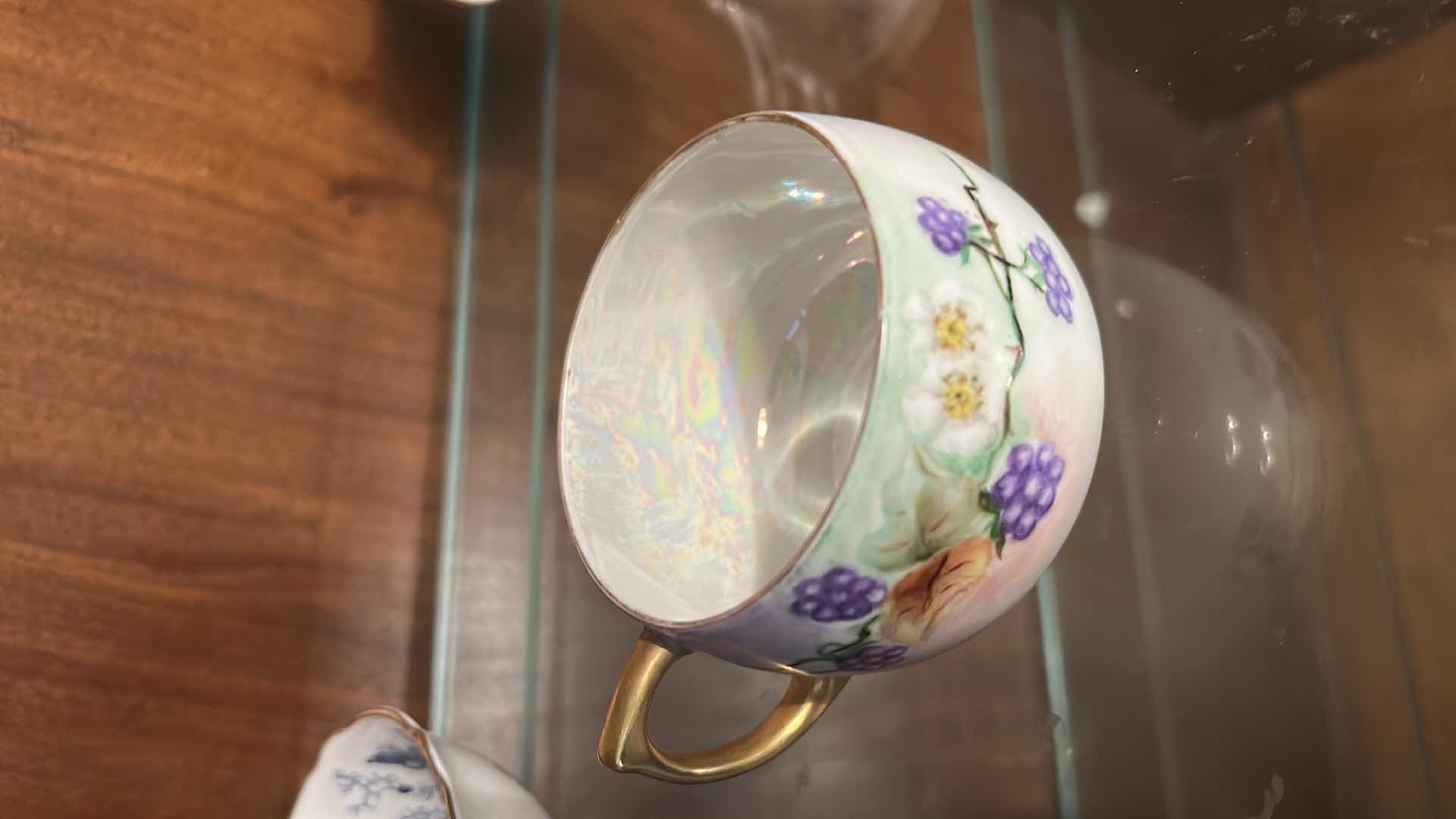 Photo 1 of 4 VINTAGE PORCELAIN CUP AND SAUCER SETS