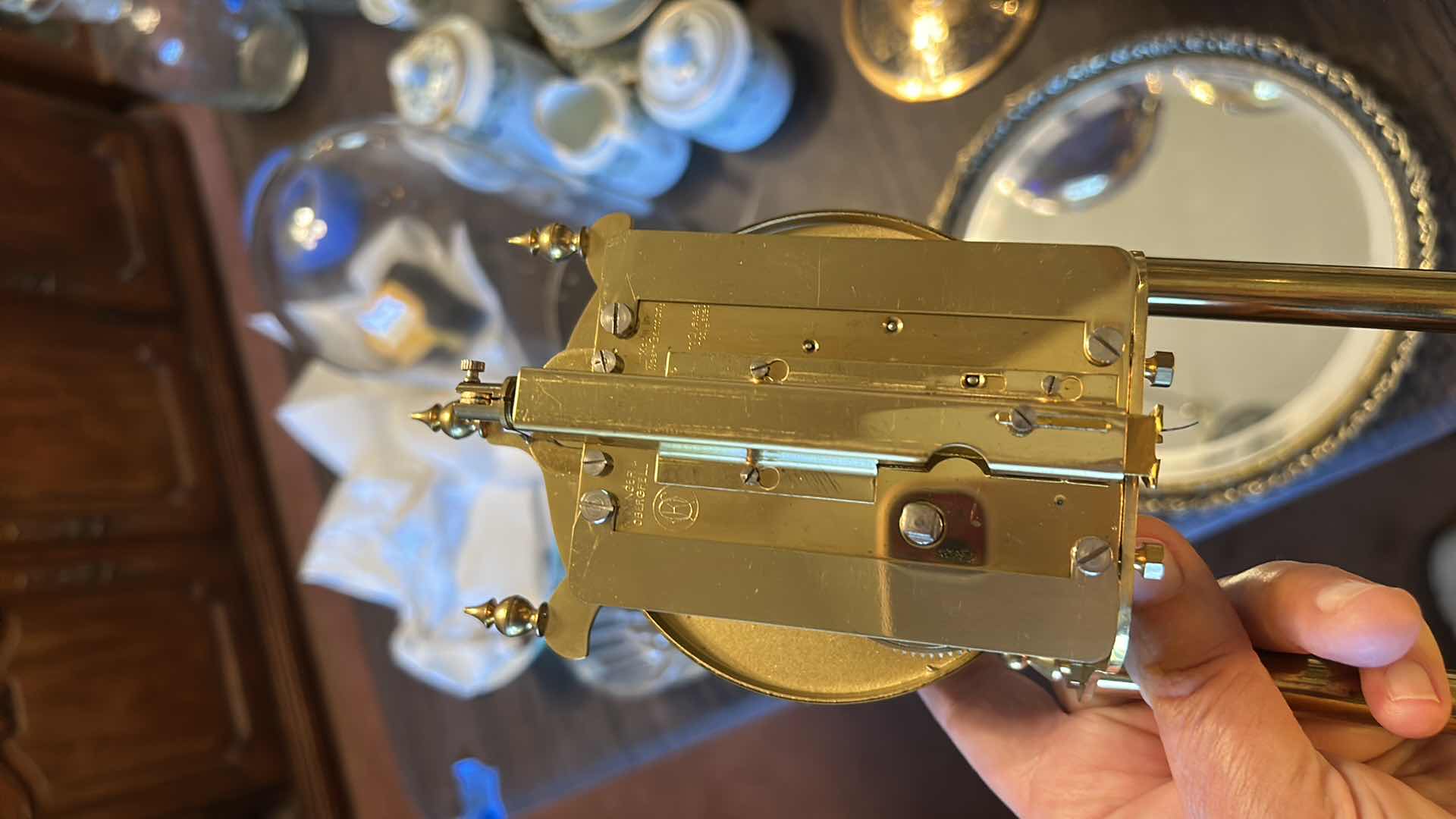 Photo 1 of VINTAGE KUNDO (KIENINGER & OBERGFELL) 400-DAY ANNIVERSARY TORSION CLOCK MANUFACTURED IN WEST GERMANY, FEATURING BRASS CONSTRUCTION AND A PROTECTIVE GLASS DOME. H11.5”