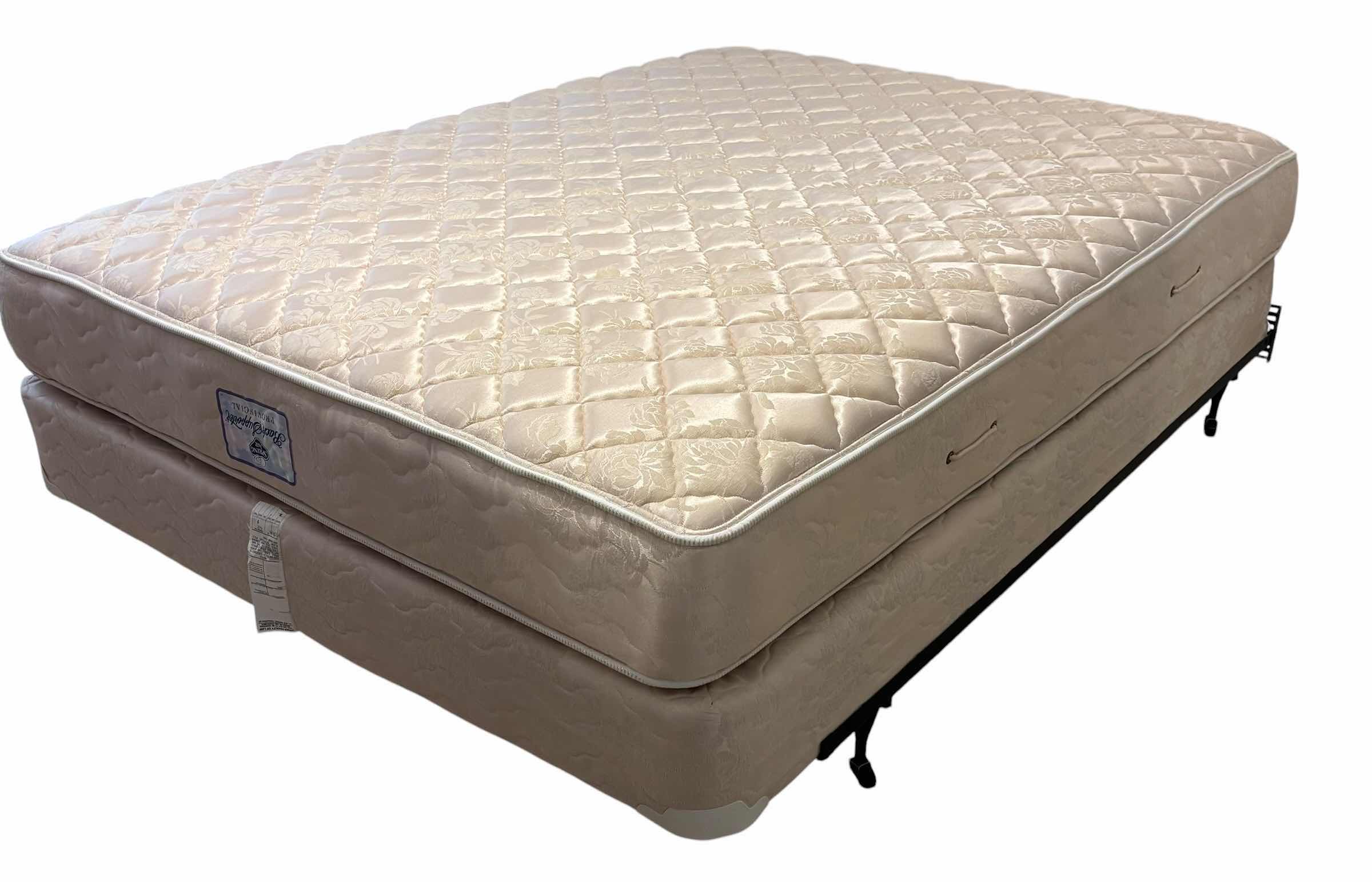 Photo 1 of SPRING AIR QUEEN SIZE BED WITH ROLLING FRAME