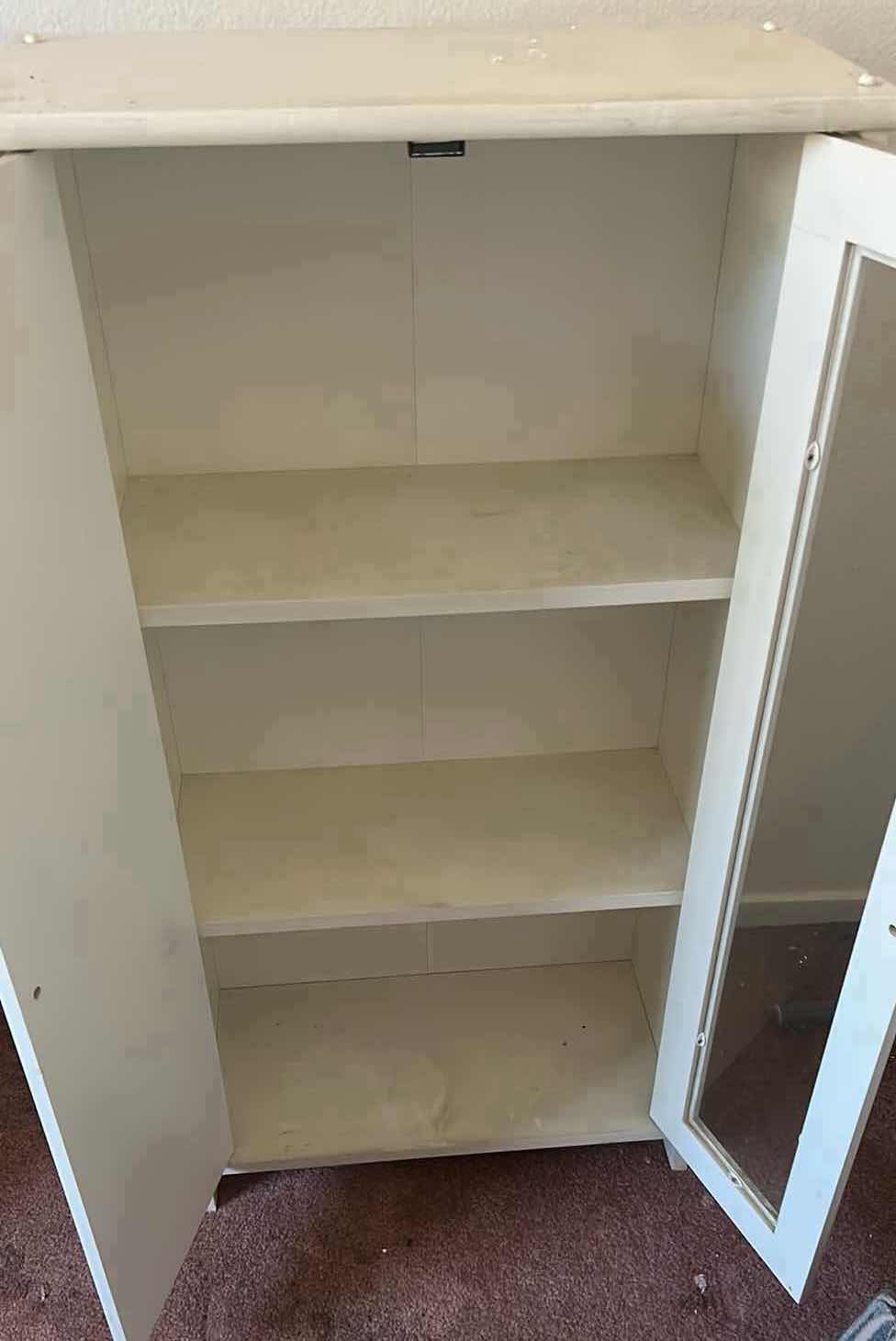 Photo 1 of WHITE FREESTANDING STORAGE CABINET W GLASS PANELED DOOR & SLATTED DOOR 19" X 10" H 35"