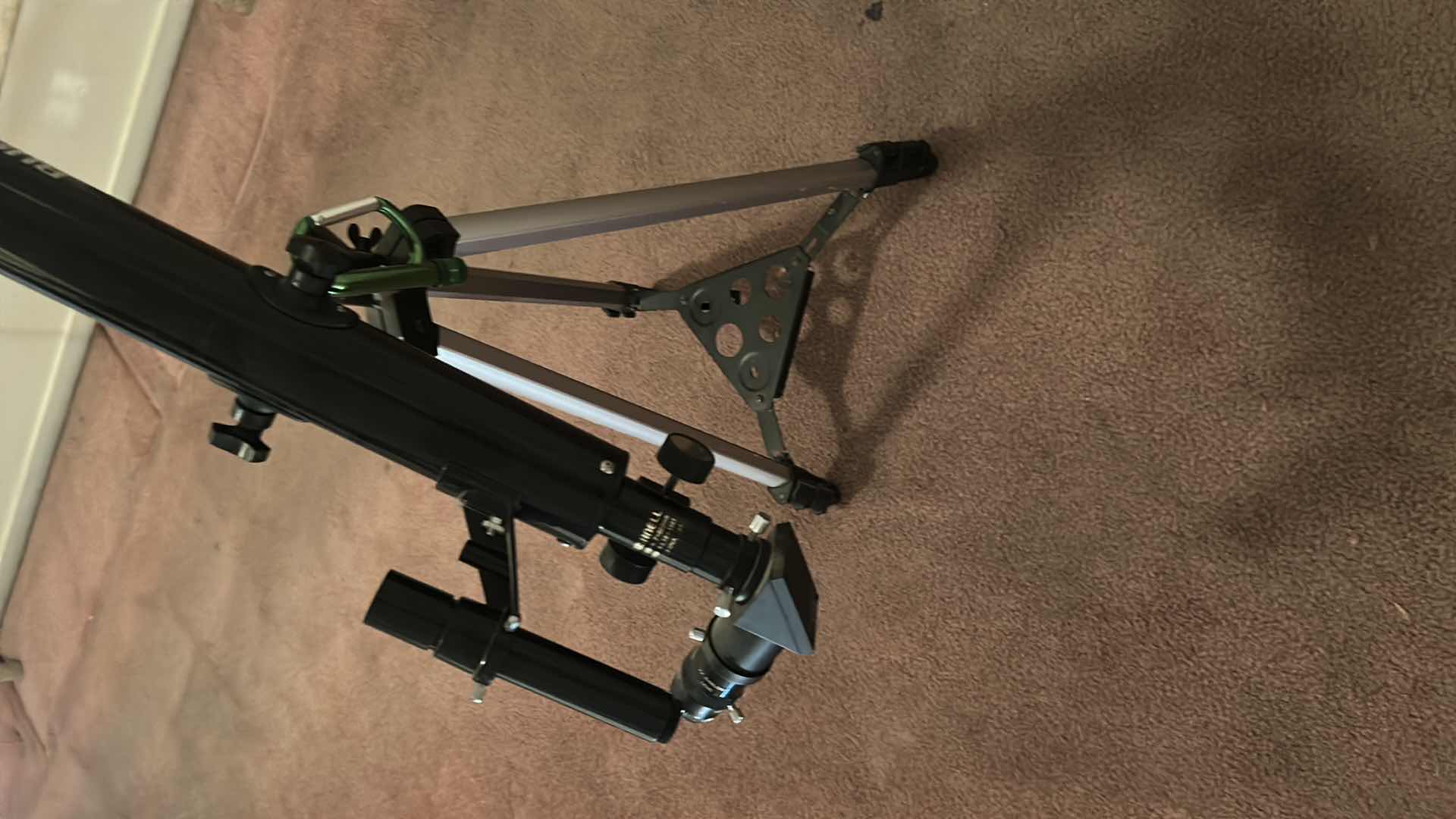 Photo 1 of BUSHNELL REFRACTOR TELESCOPE ON A TRIPOD