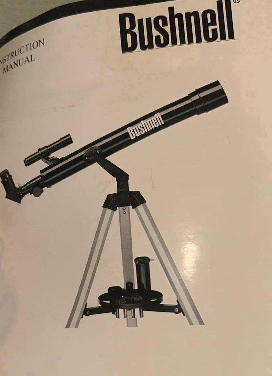 Photo 1 of BUSHNELL REFRACTOR TELESCOPE ON A TRIPOD