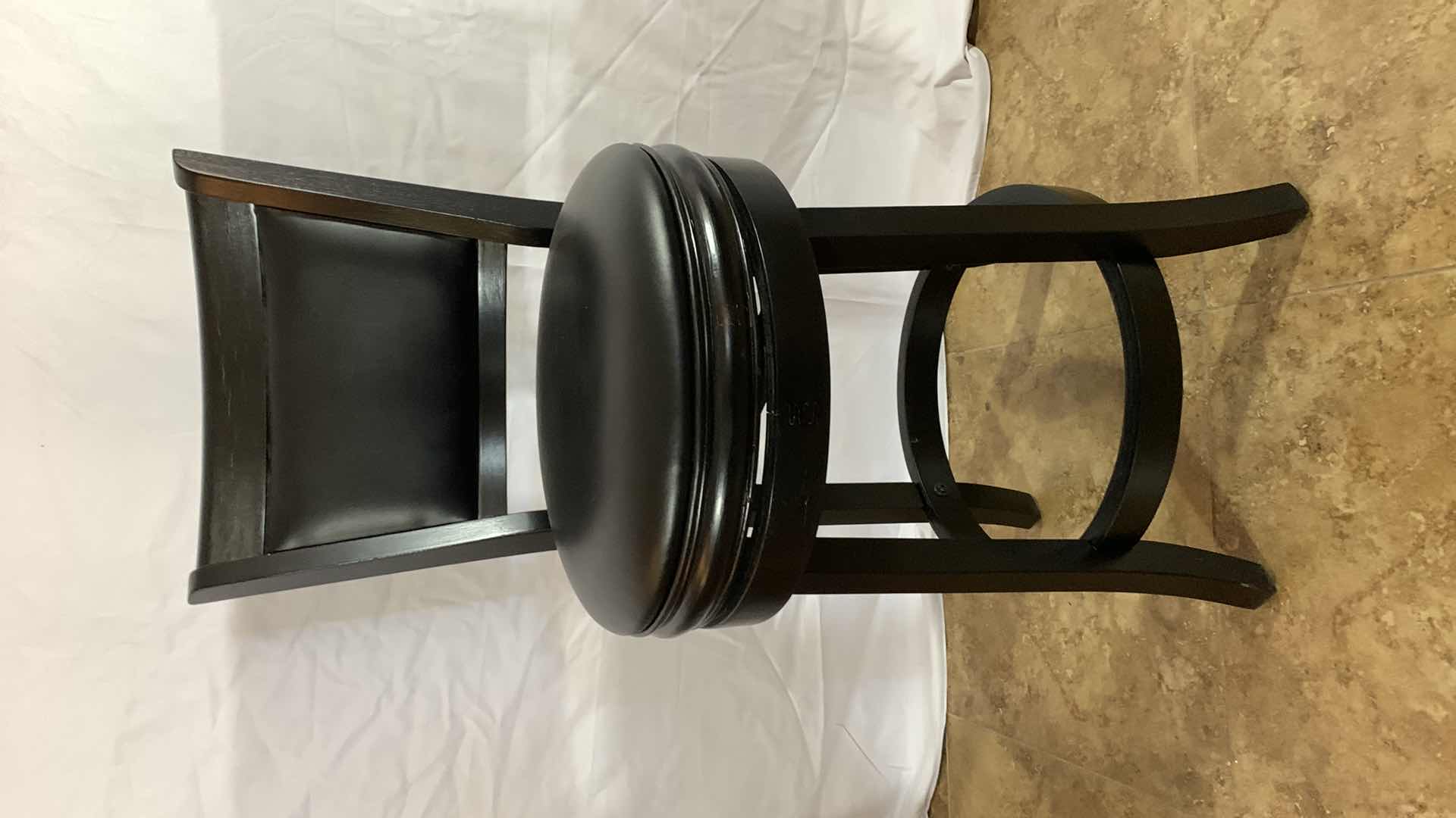 Photo 1 of WOODEN SWIVEL COUNTER STOOL 37” TALL