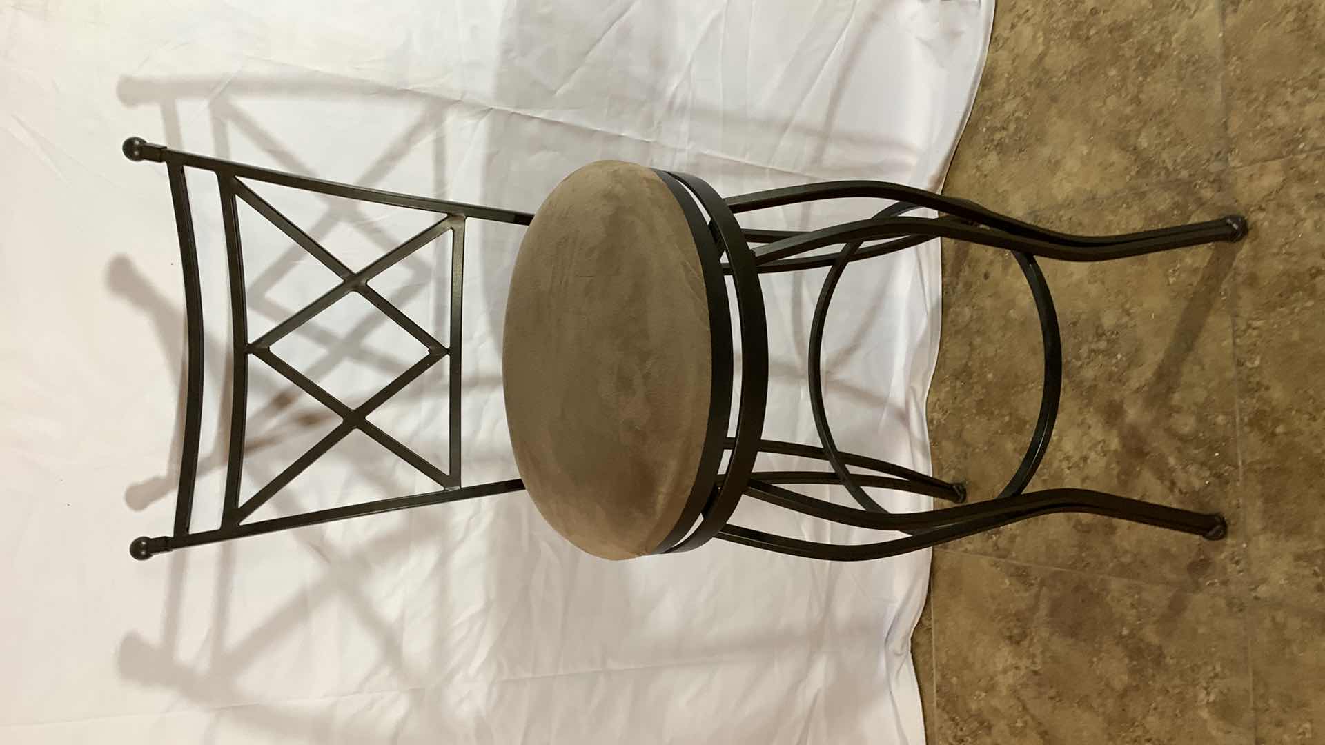 Photo 1 of METAL BAR SWIVEL STOOL 45” TALL