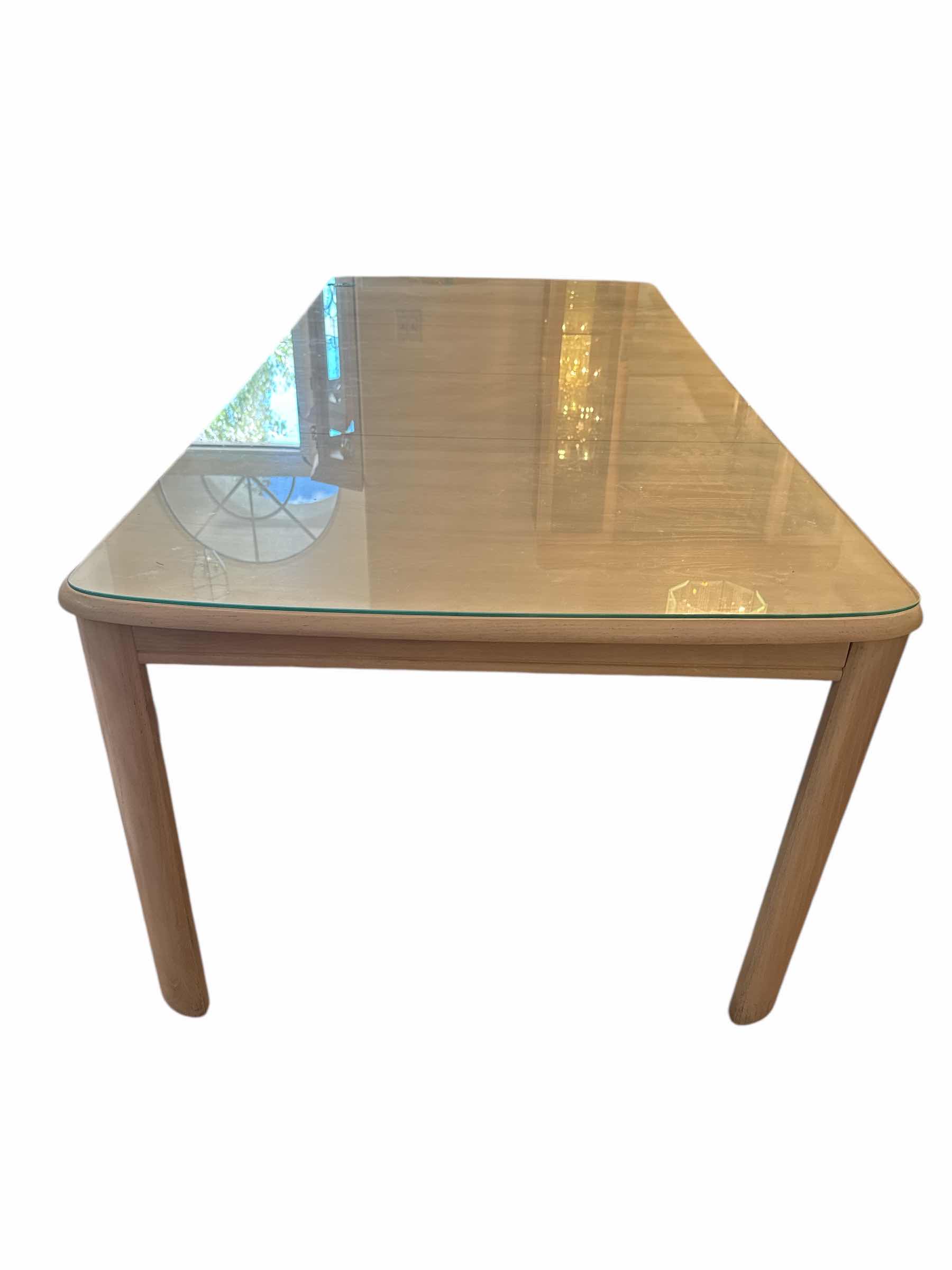 Photo 1 of MID CENTURY MODERN MAPLE COLORED DINING TABLE WITH 2 EXTENSIONS AND GLASS TOP
FULLY EXTENDED AT 88” X 41” H30”