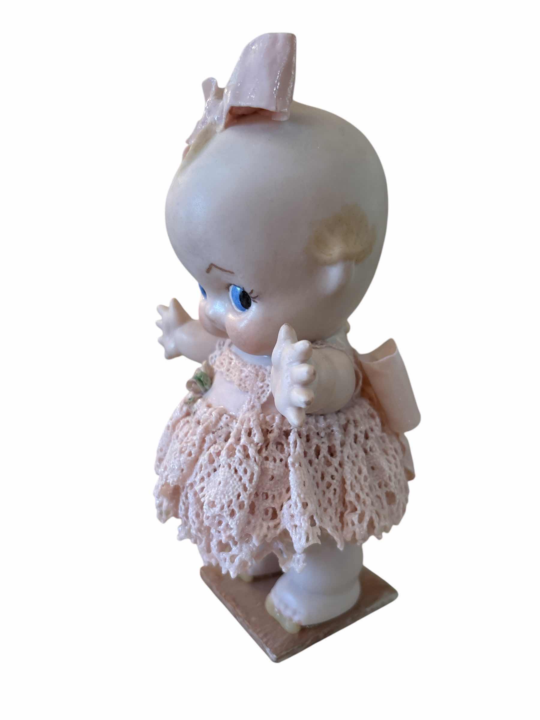 Photo 1 of PORCELAIN KEWPIE - VERY FRAGILE - PINK BABY WITH BROKEN BOWS