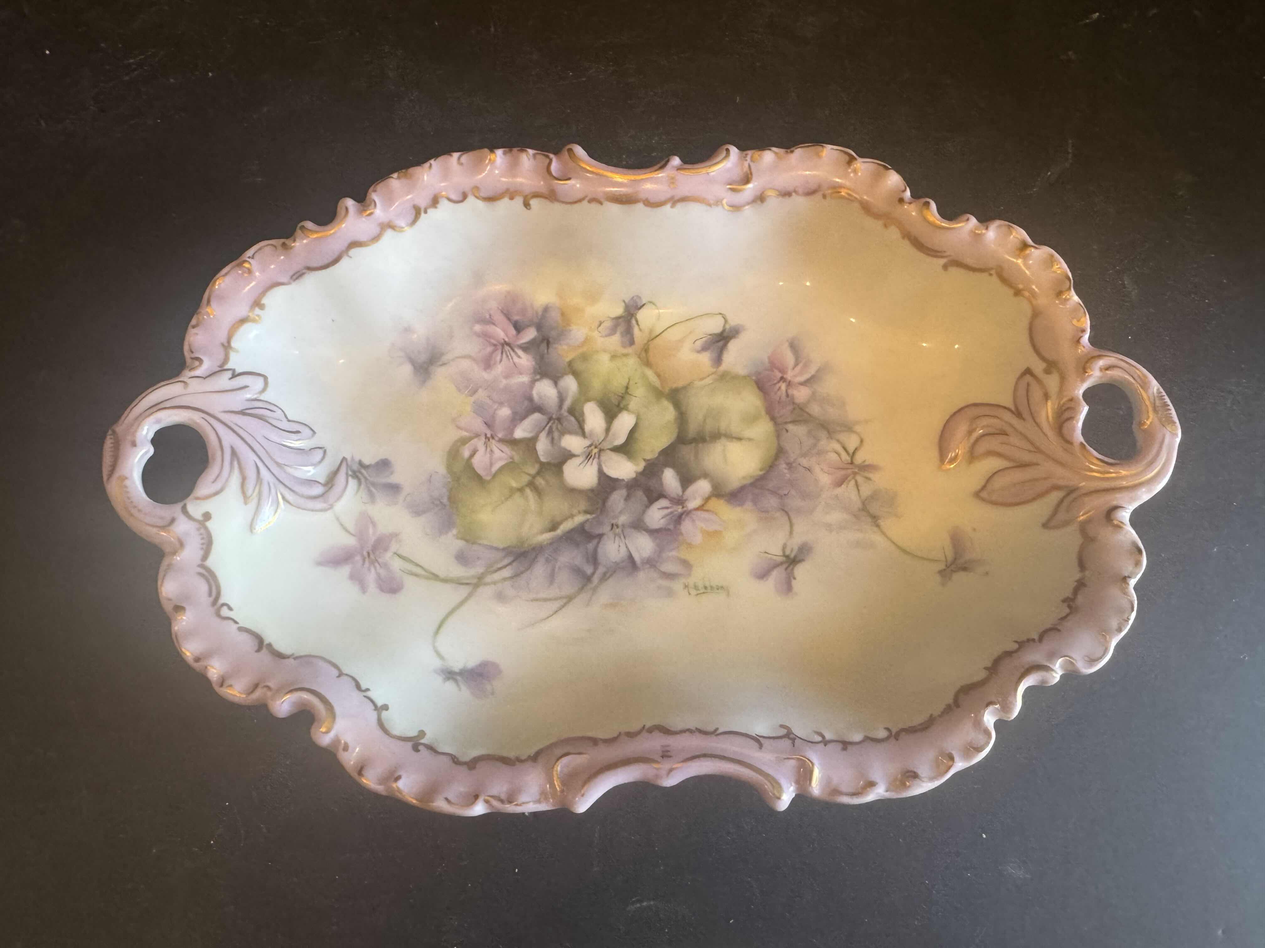 Photo 1 of VINTAGE  HAND PAINTED PORCELAIN DRESSER TRAY/TRINKET DISH, H. GIBBONS AND TEABAG HOLDER PLATES BY L. CLARK. 

TRAY/ TRINKET DISH
9.5” X 6” X H1.5”
TEABAG HOLDERS
4.5” X 3.5” X H.25”