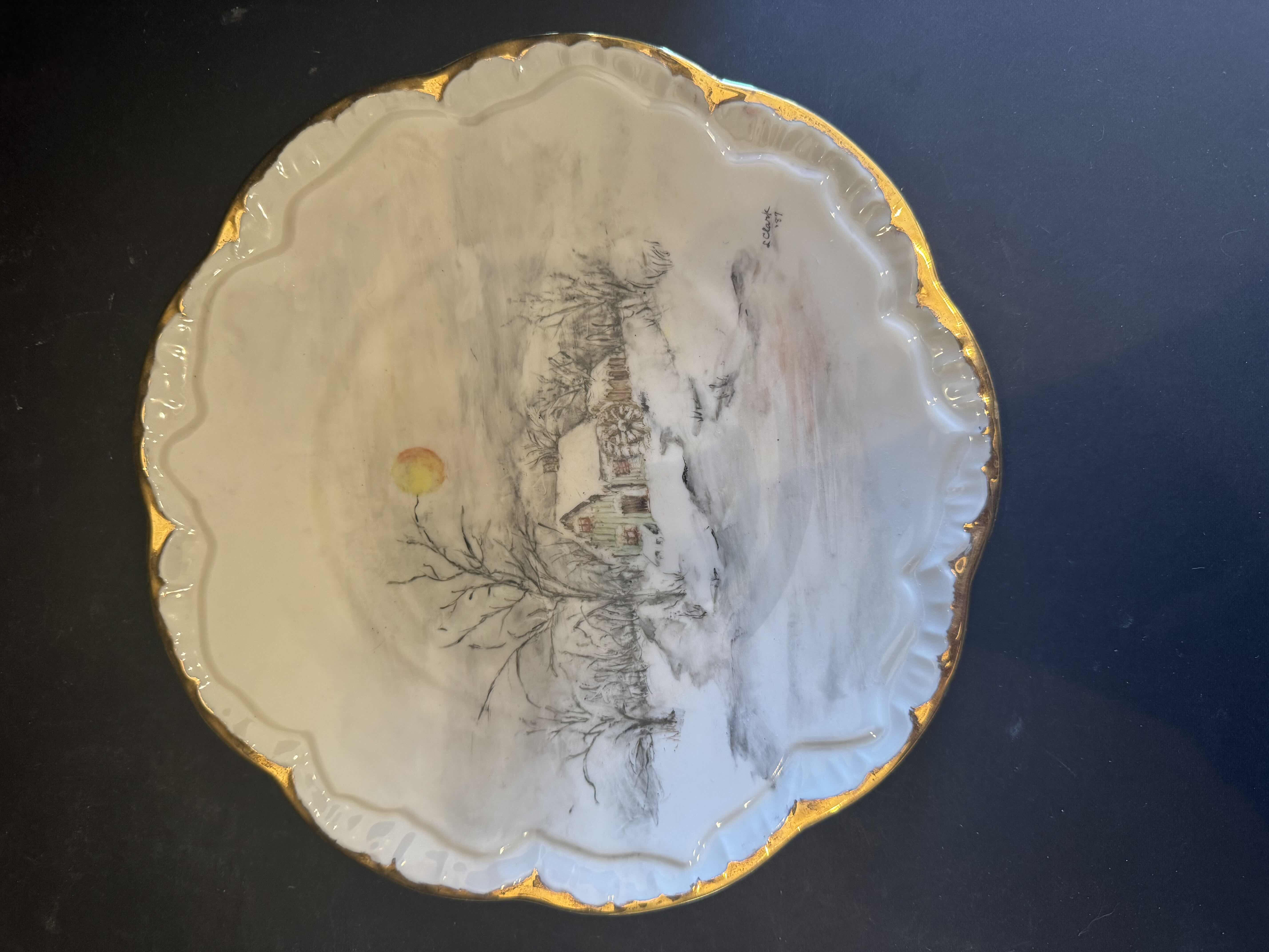 Photo 1 of VINTAGE L. CLARK PORCELAIN COLLECTABLE PLATES, 1983 AND 1987

FLORAL PLATE
D10.25”
WINTER LANDSCAPE 
D9.5”