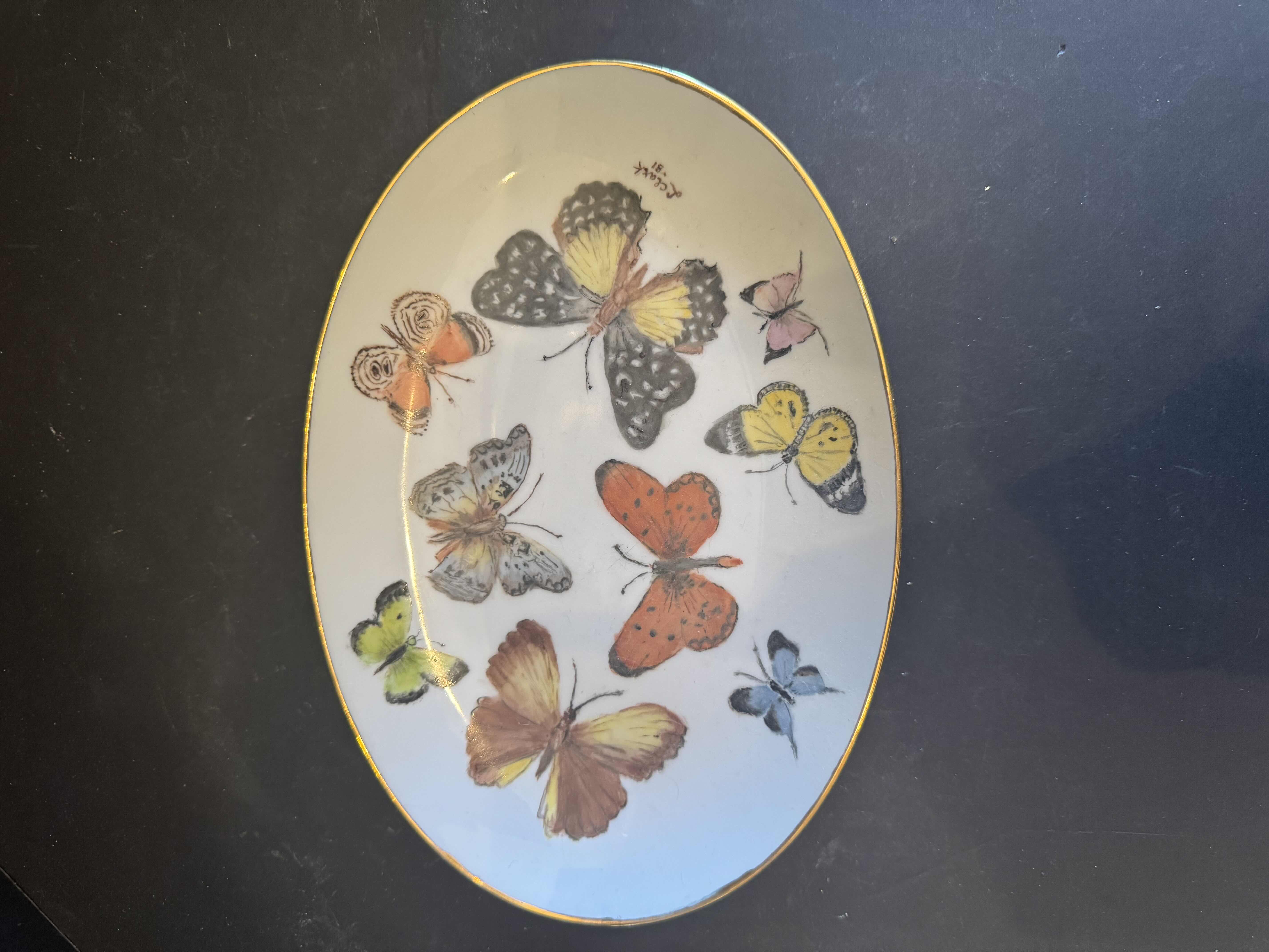 Photo 1 of VINTAGE PORCELAIN COLLECTION, FINE CHINA, L. CLARK AND LEFTON, PLATES, CANDY DISH, AND TEABAG HOLDER

BUTTERFLY DISH
9.5” X 6.5” X H1”
FLORAL DISH
D8.25”
FLORAL CANDY DISH
D5.25”
TEABAG HOLDER
D4.25”
