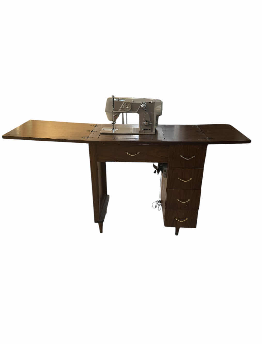 Photo 1 of VINTAGE SEWING MACHINE WORKSTATION WOODEN CABINET

WHEN OPEN
59” X 17” X H30”