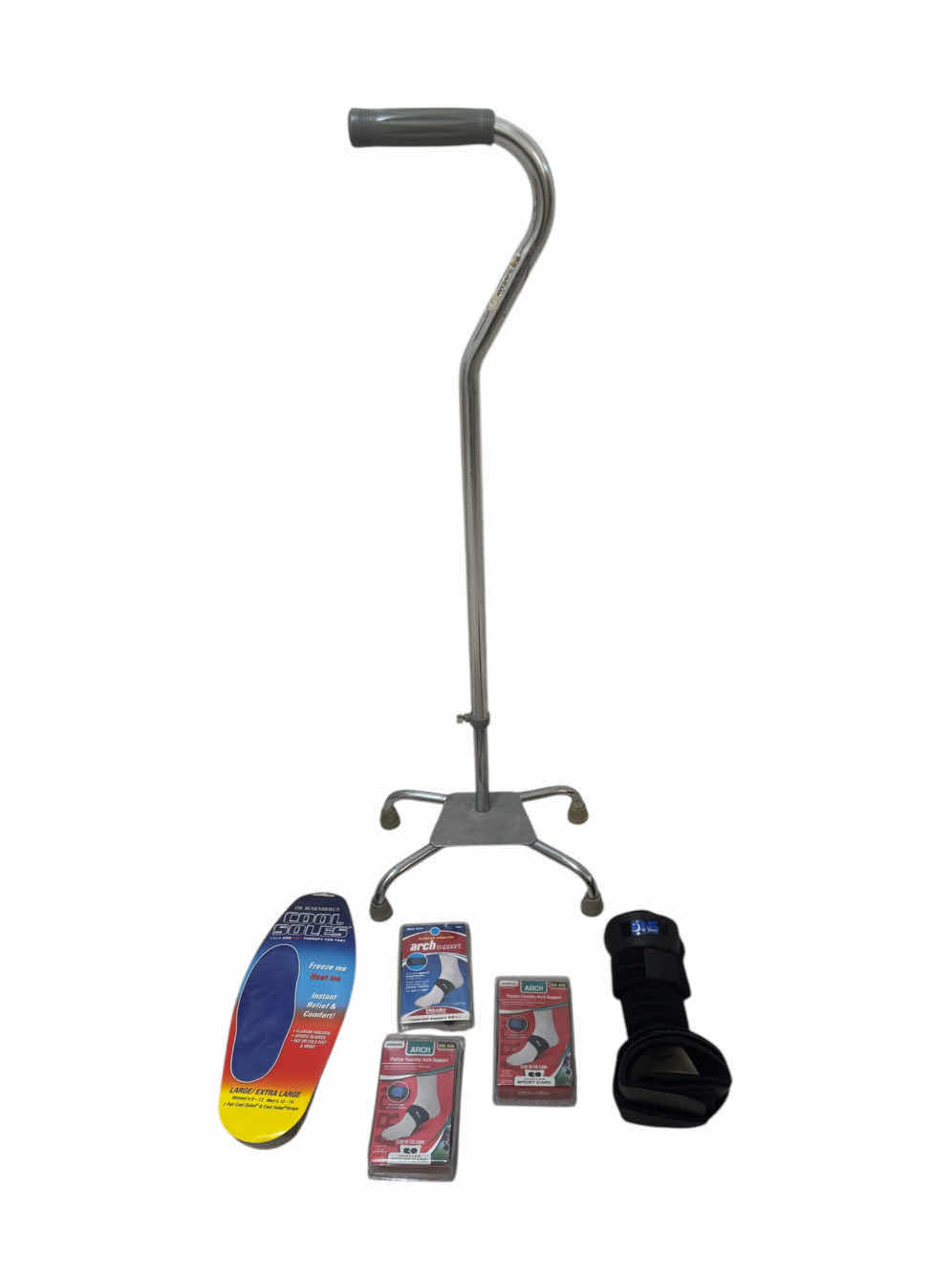 Photo 1 of GUARDIAN ADJUSTABLE METAL QUAD CANE AND SOLE AND ARCH SUPPORT ORTHOTICS SUPPLIES

CANE
12” X 8” X H34”