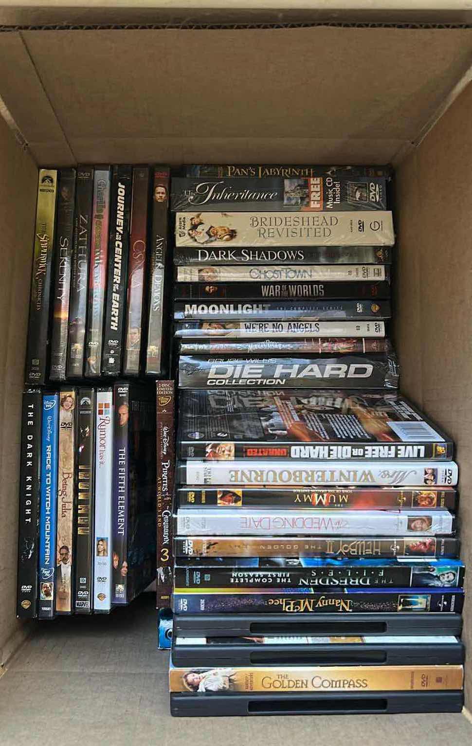 Photo 1 of CONTENTS OF BOX ASSORTED DVD’S