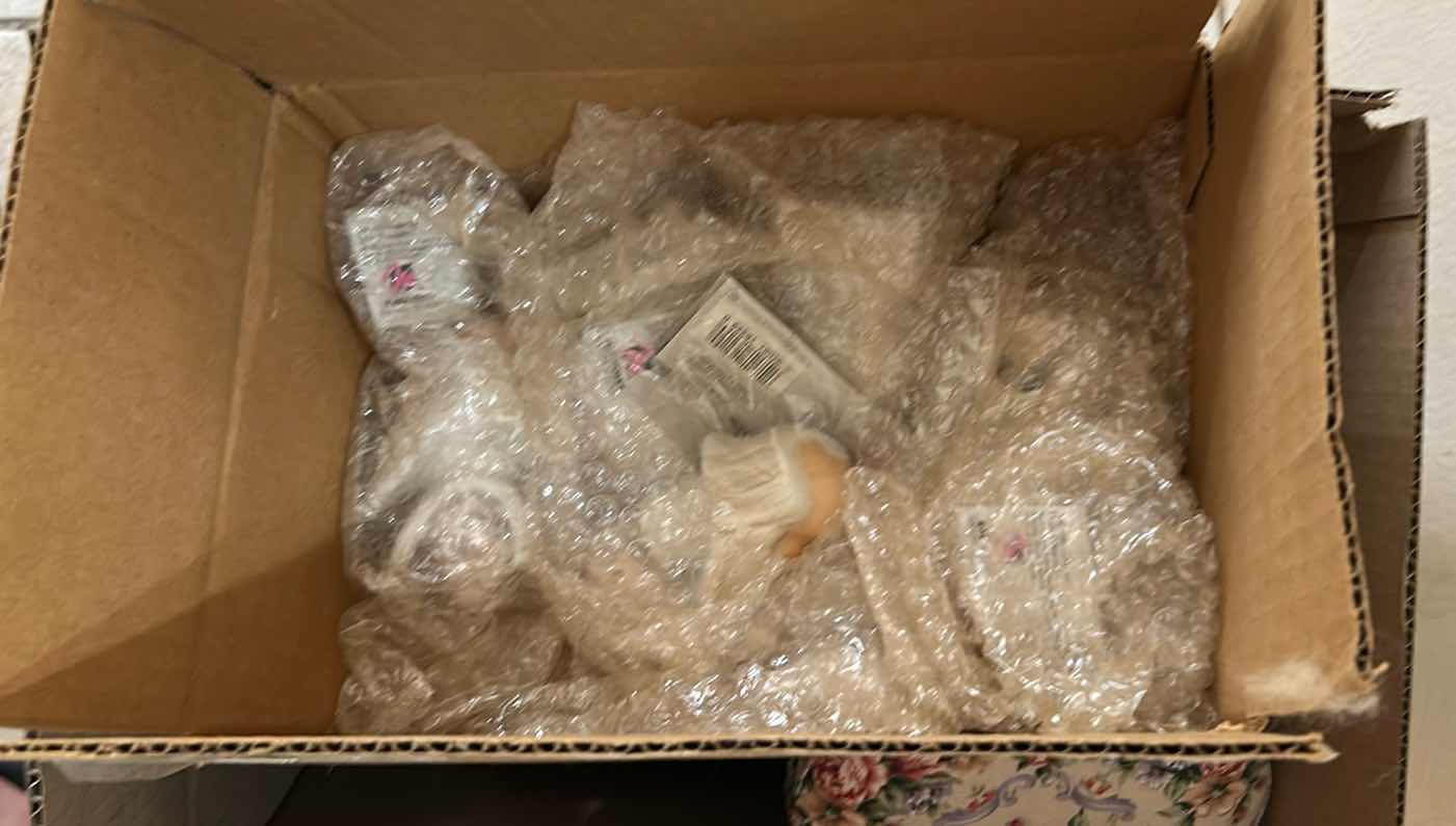 Photo 1 of CONTENTS OF BOX ASSORTED DOLL HEADS HANDS