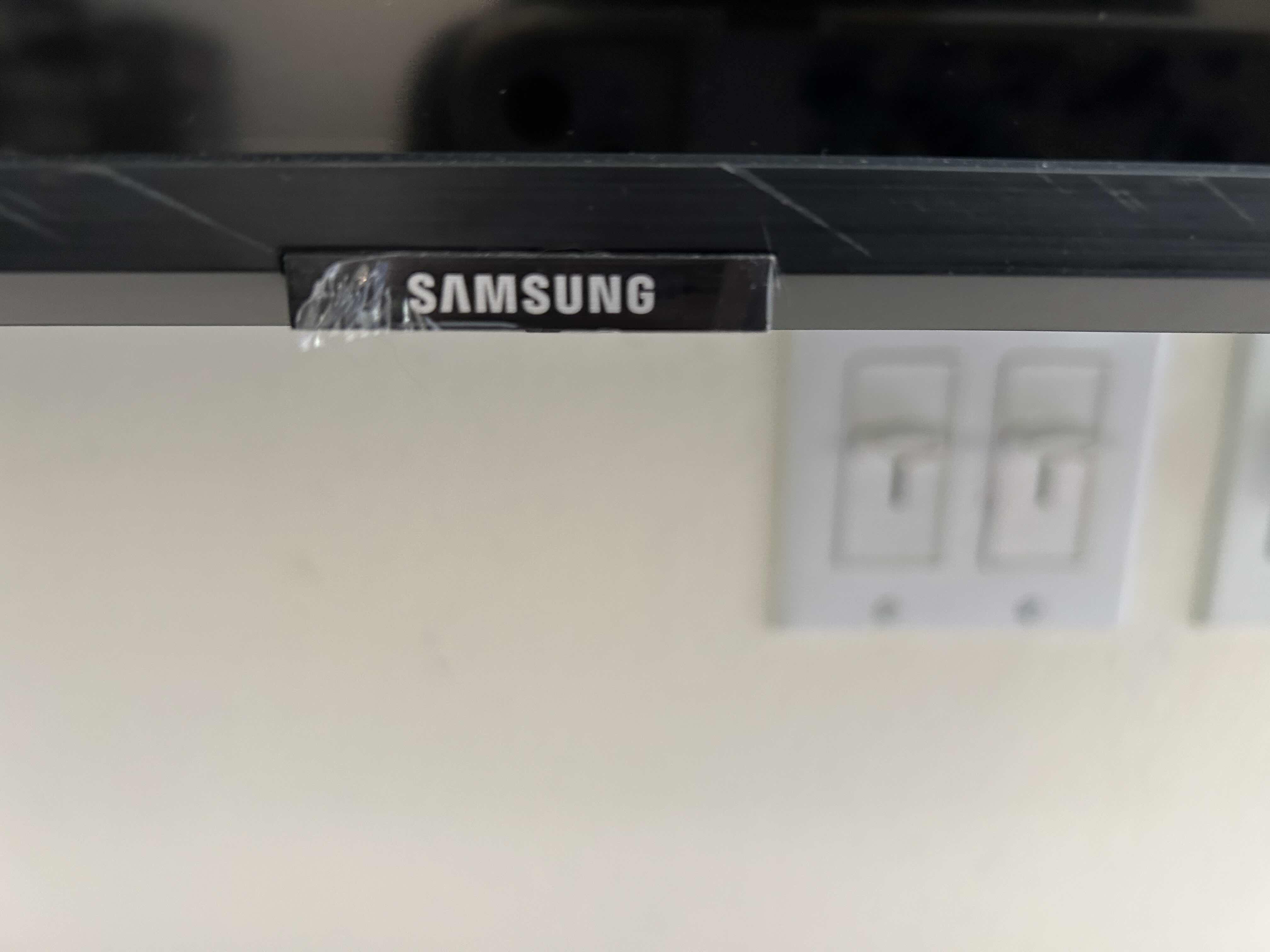 Photo 1 of 55” SAMSUNG TV W REMOTE AND WALL BRACKET