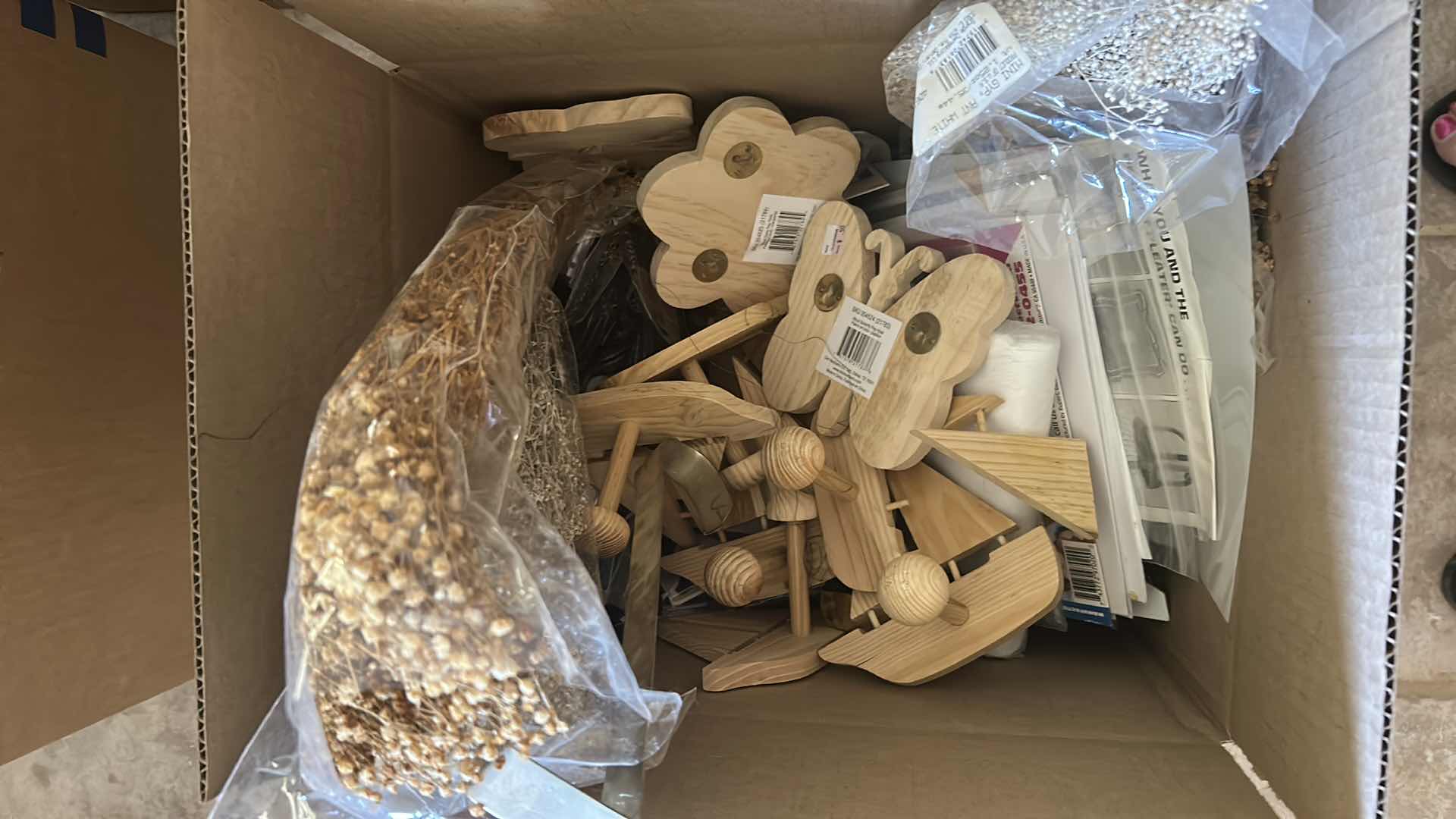 Photo 1 of CONTENTS OF BOX ASSORTED WOOD PEG HOOKS BABY BREATH