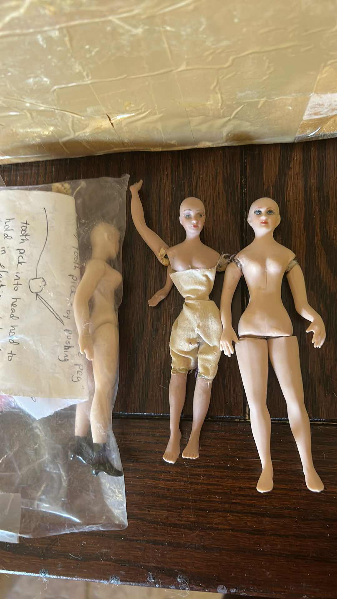 Photo 1 of CONTENTS OF 2 BOXES CERAMIC DOLL PARTS