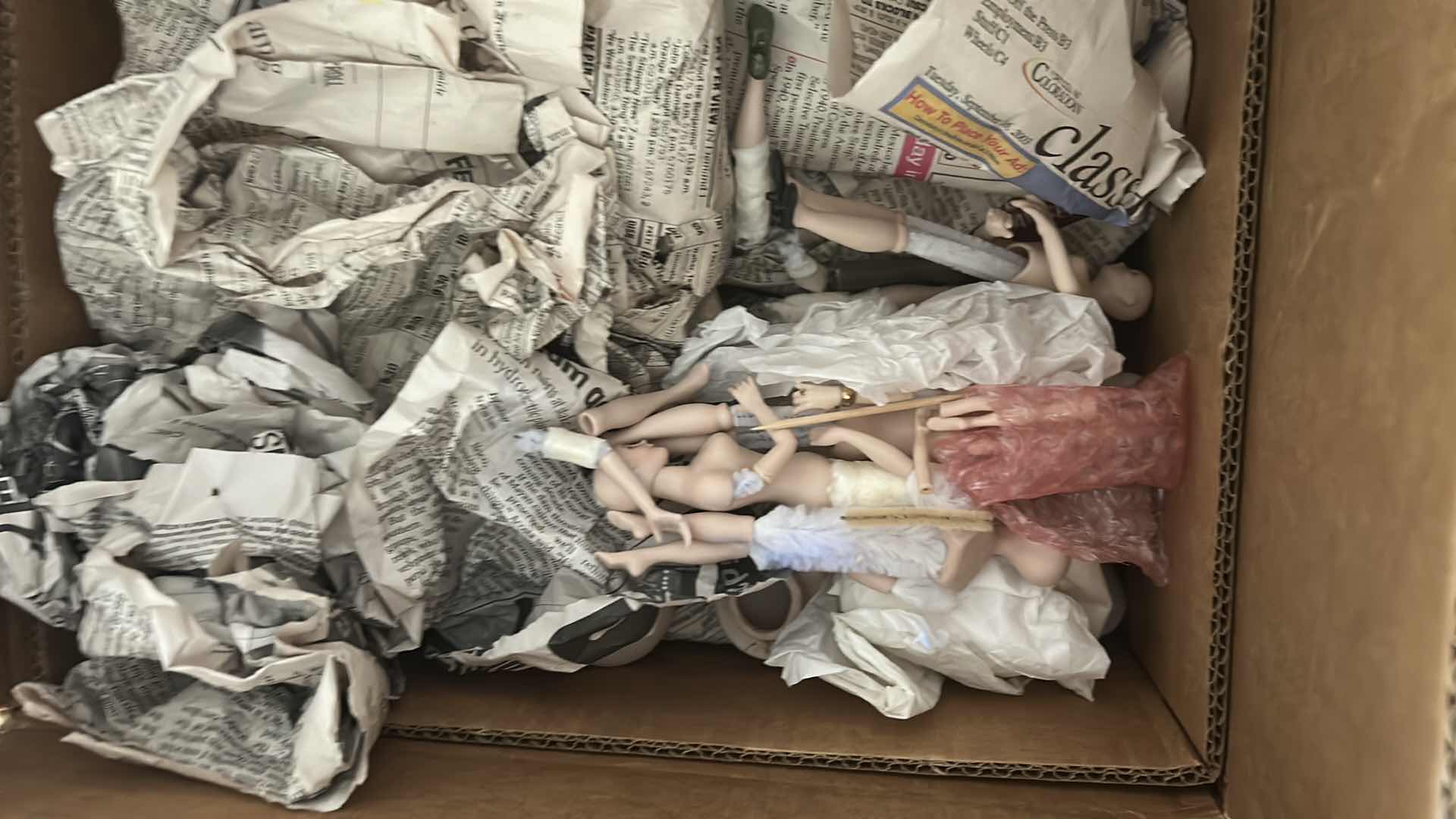Photo 1 of CONTENTS OF 2 BOXES CERAMIC DOLL PARTS