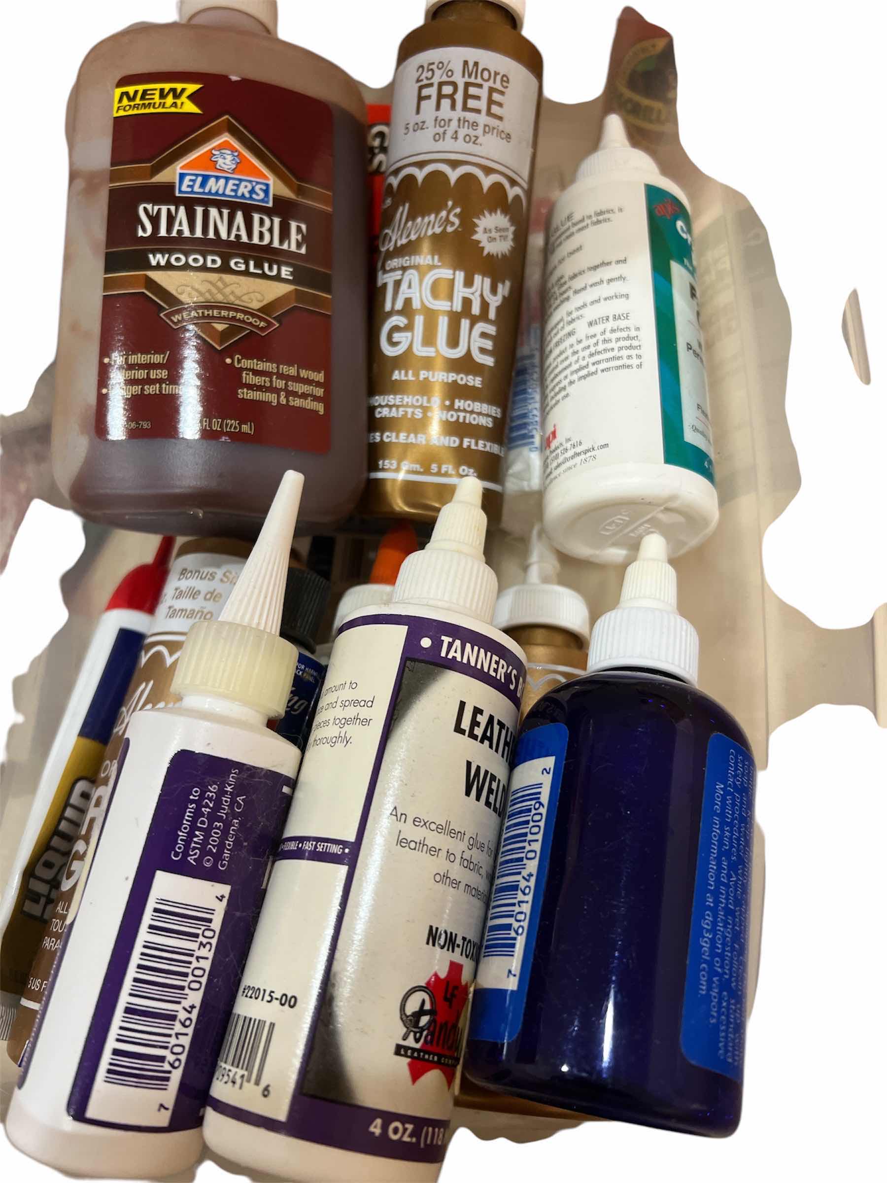 Photo 1 of BOX OF GLUE FOR VARIOUS CRAFTING AND HOME APPLICATION USES