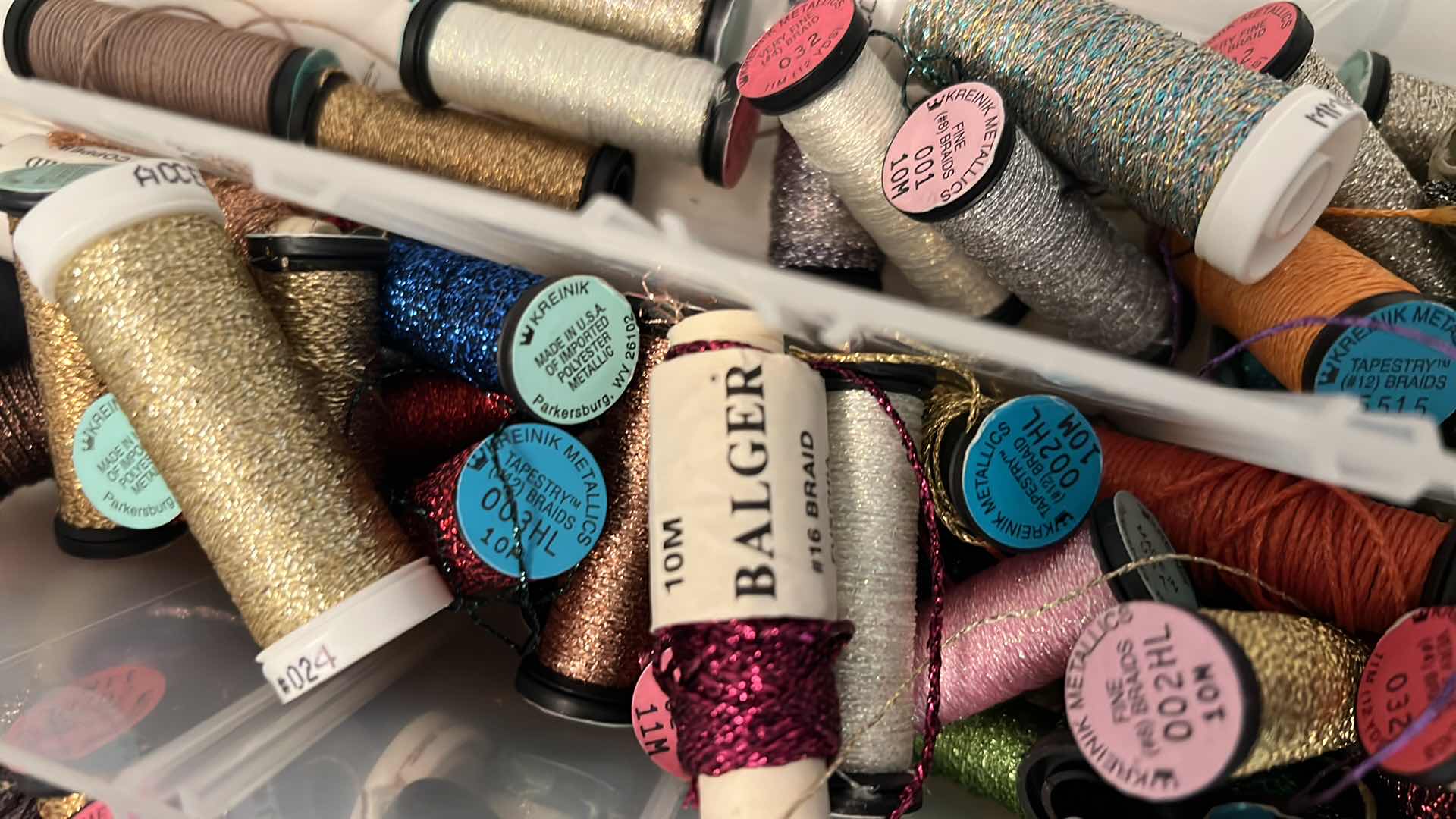 Photo 1 of TOTE OF EMBROIDERY THREAD
