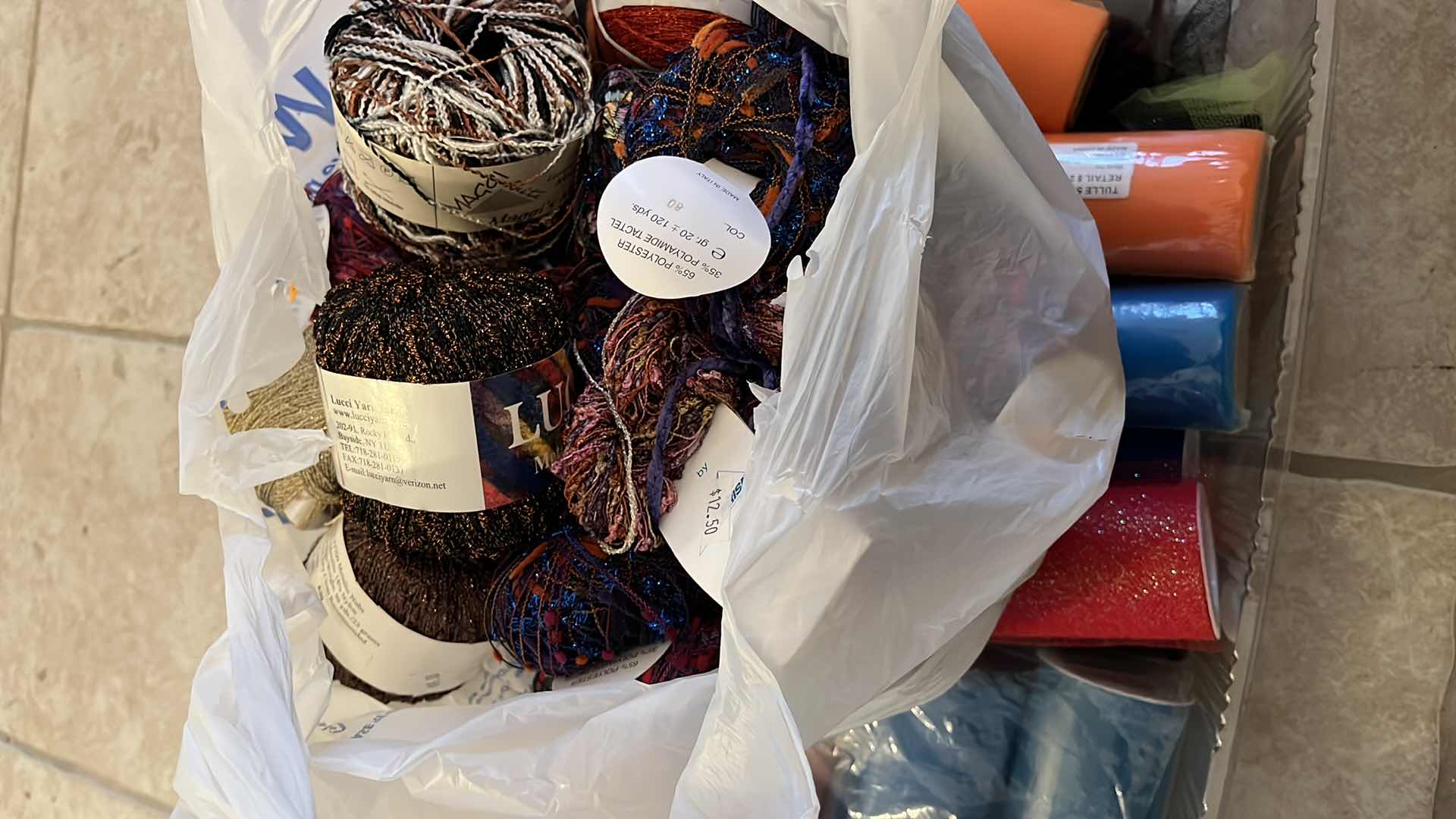 Photo 1 of CONTAINER AND BAG OF ASSORTED COLORFUL CRAFTING MATERIALS TINSEL AND KNITTING YARN